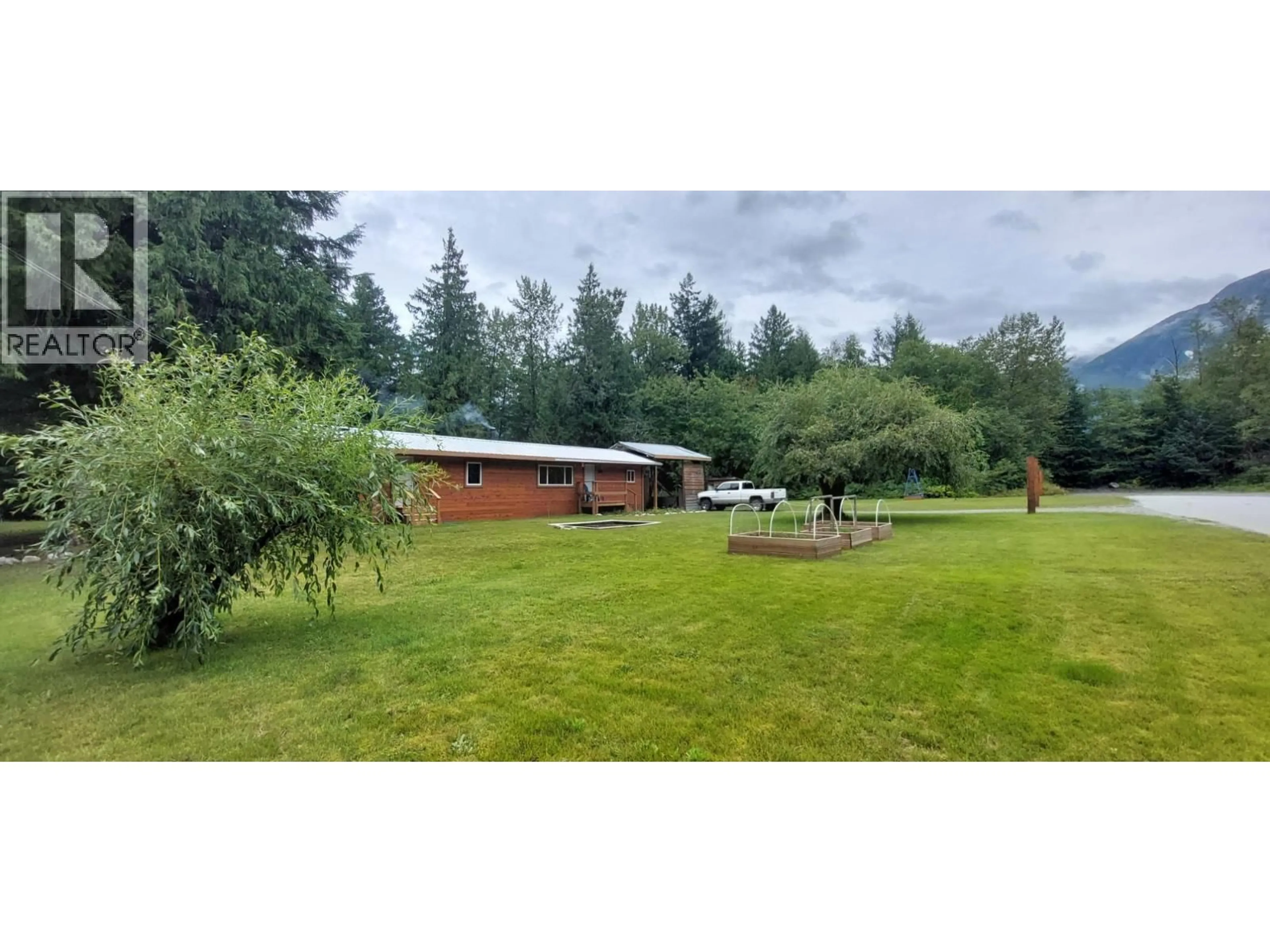 A pic from outside/outdoor area/front of a property/back of a property/a pic from drone, mountain view for 520 TONQUIN ROAD, Bella Coola British Columbia V0T1C0