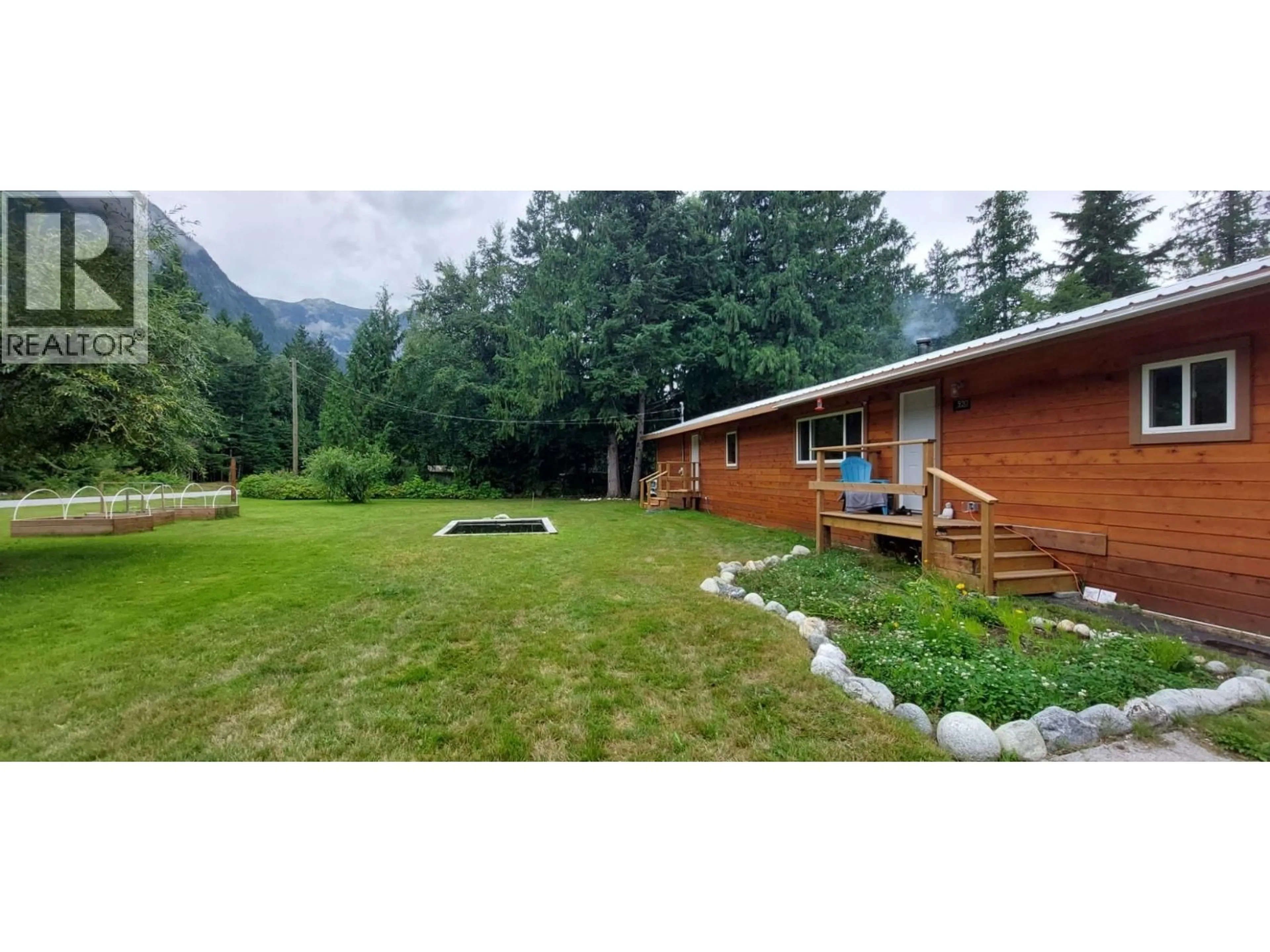 A pic from outside/outdoor area/front of a property/back of a property/a pic from drone, mountain view for 520 TONQUIN ROAD, Bella Coola British Columbia V0T1C0