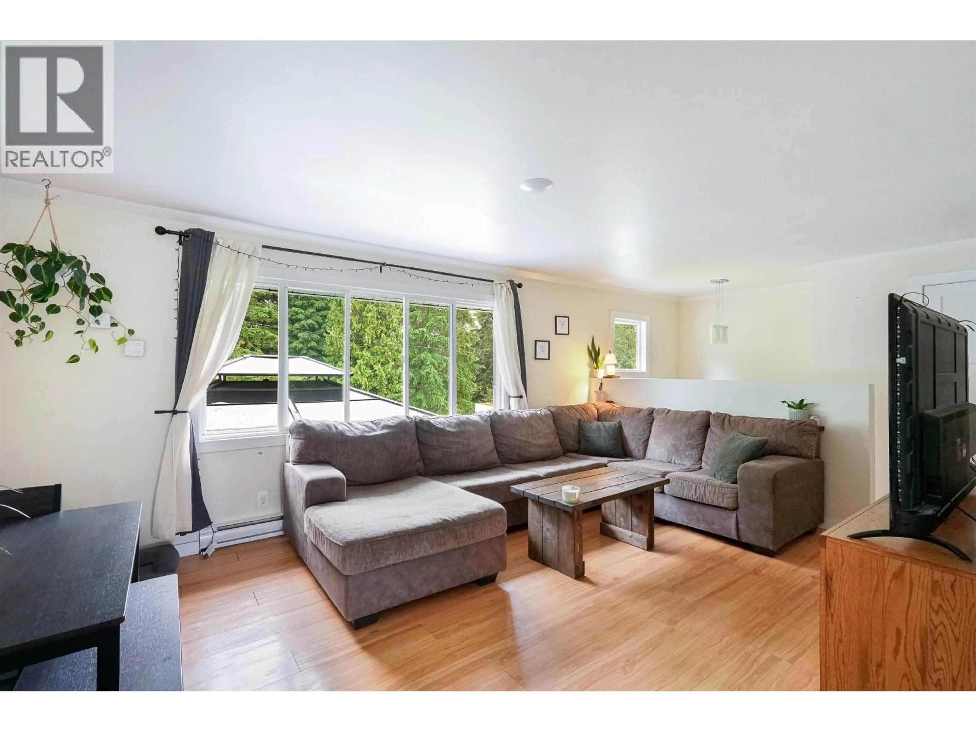 Living room with furniture, wood/laminate floor for 13 GROUSE STREET, Kitimat British Columbia V8C1P7