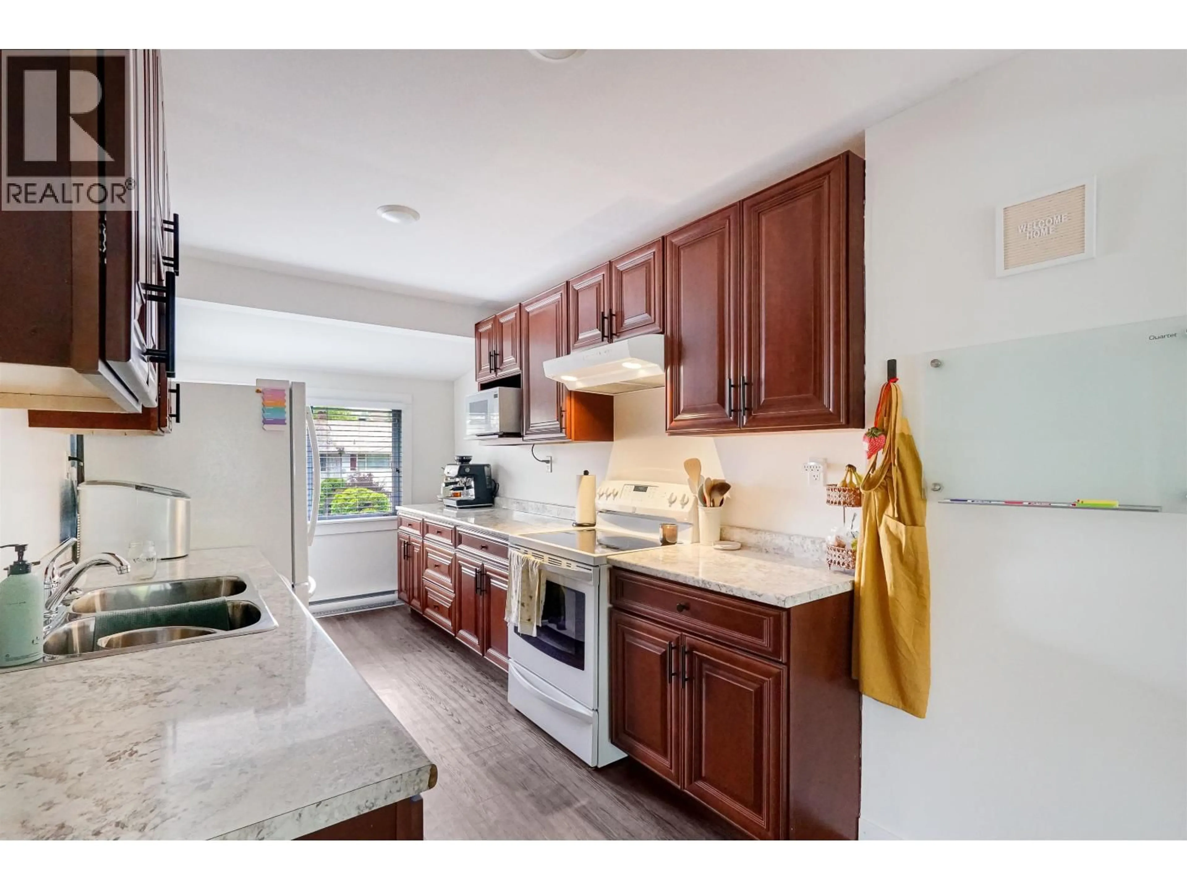 Open concept kitchen, ceramic/tile floor for 13 GROUSE STREET, Kitimat British Columbia V8C1P7