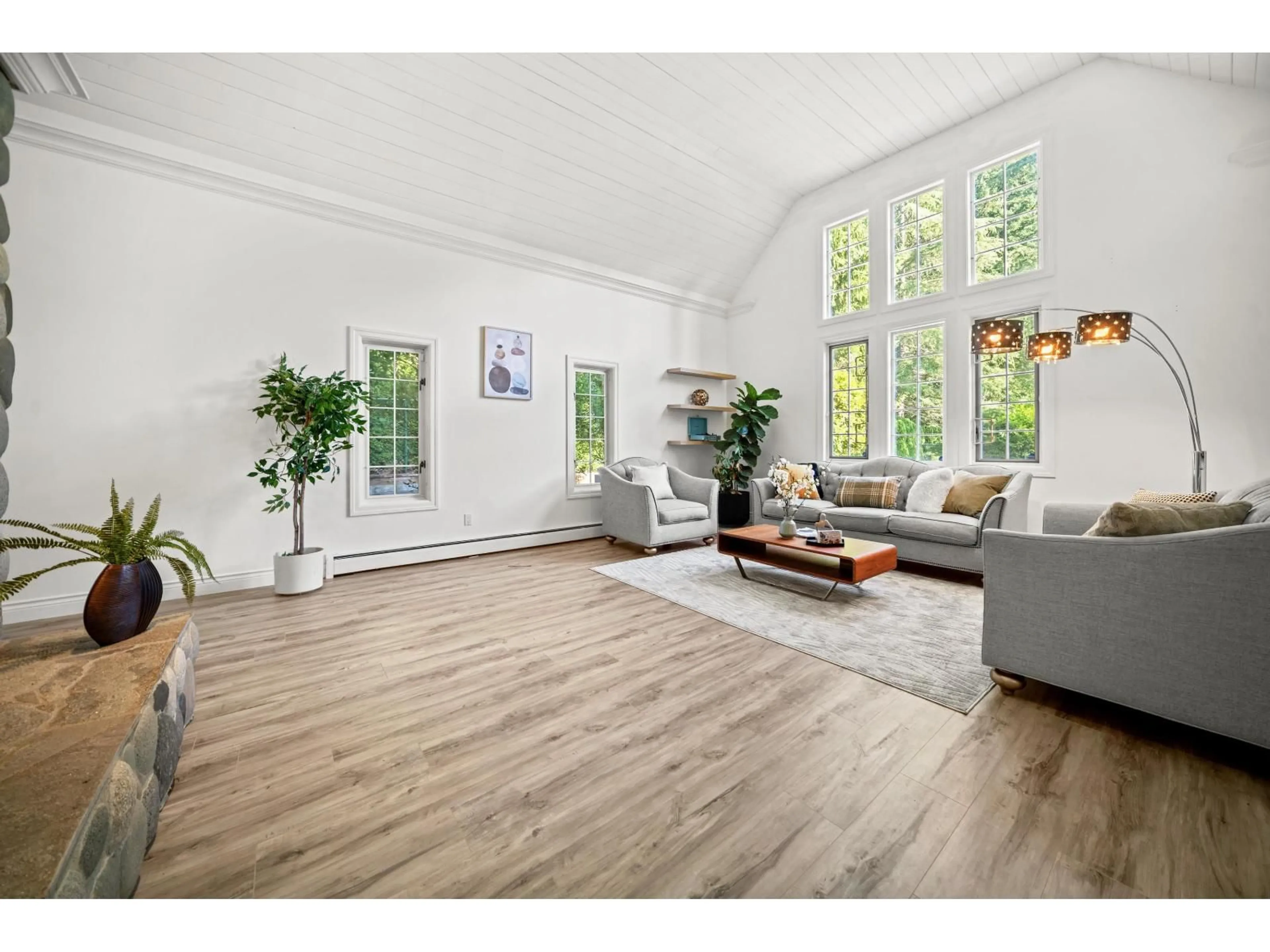 Living room with furniture, wood/laminate floor for 13411 25TH AVENUE, Surrey British Columbia V4P1Y8