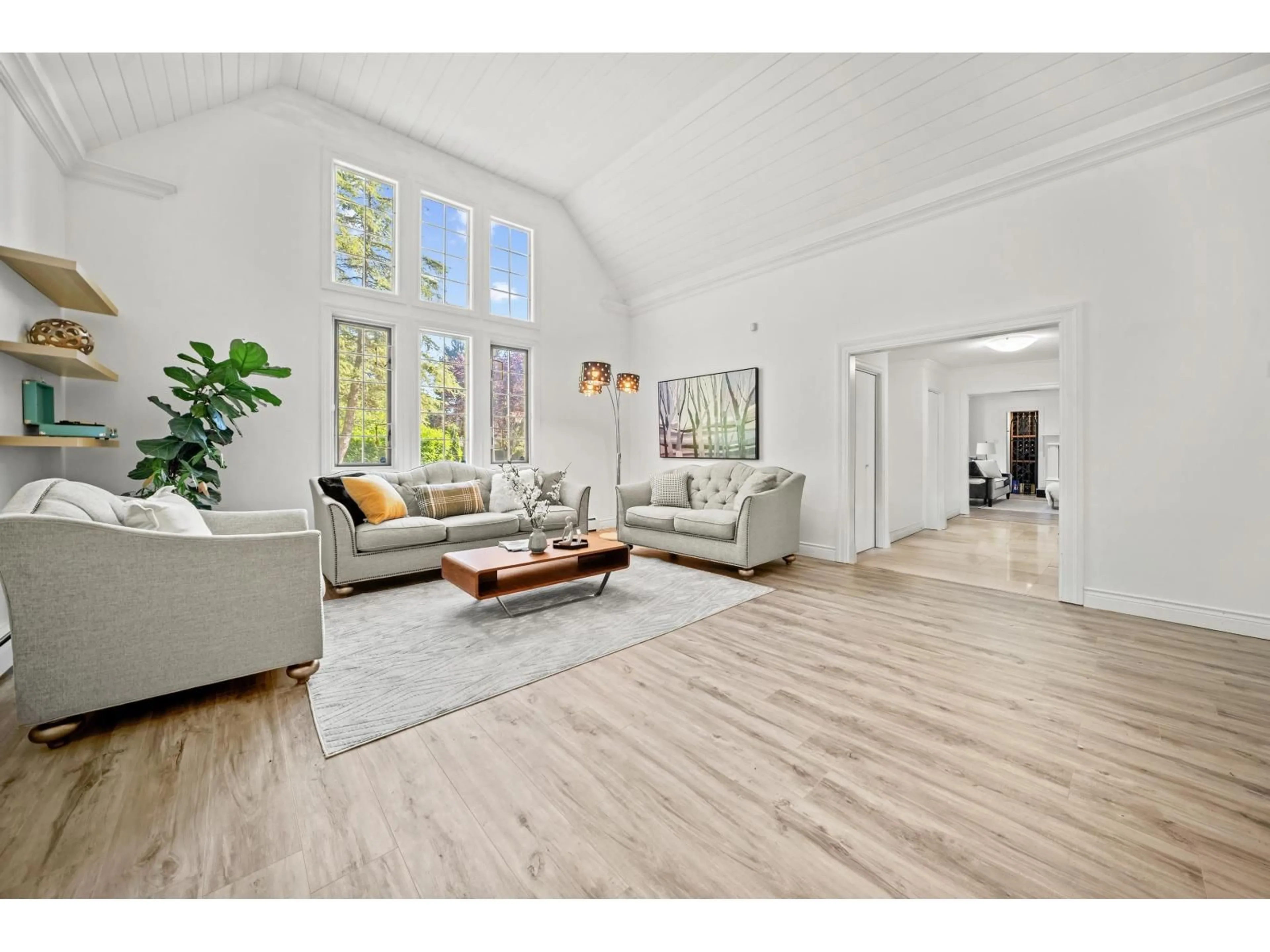 Living room with furniture, wood/laminate floor for 13411 25TH AVENUE, Surrey British Columbia V4P1Y8