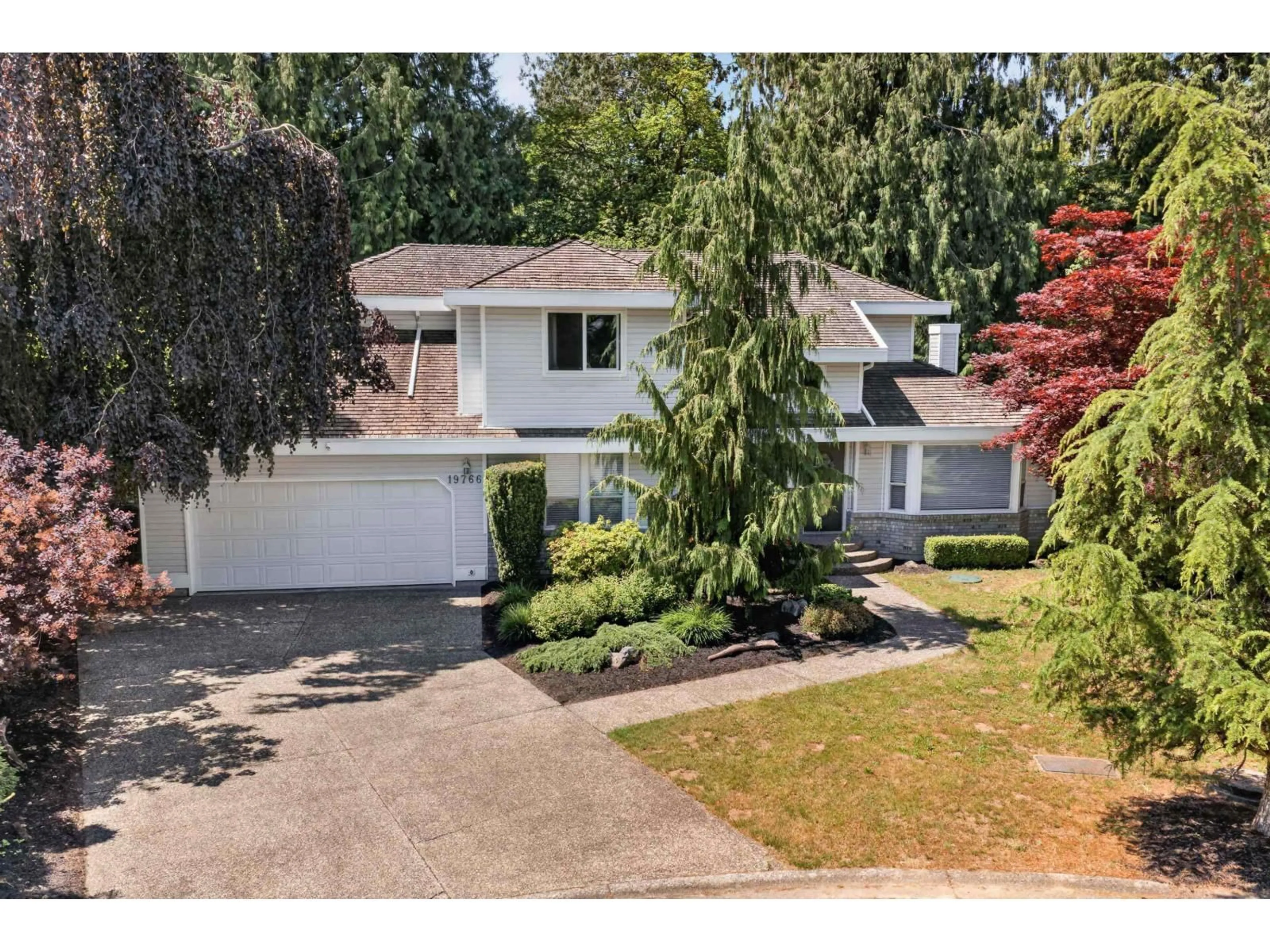 A pic from outside/outdoor area/front of a property/back of a property/a pic from drone, street for 19766 43 AVENUE, Langley British Columbia V3A8G1