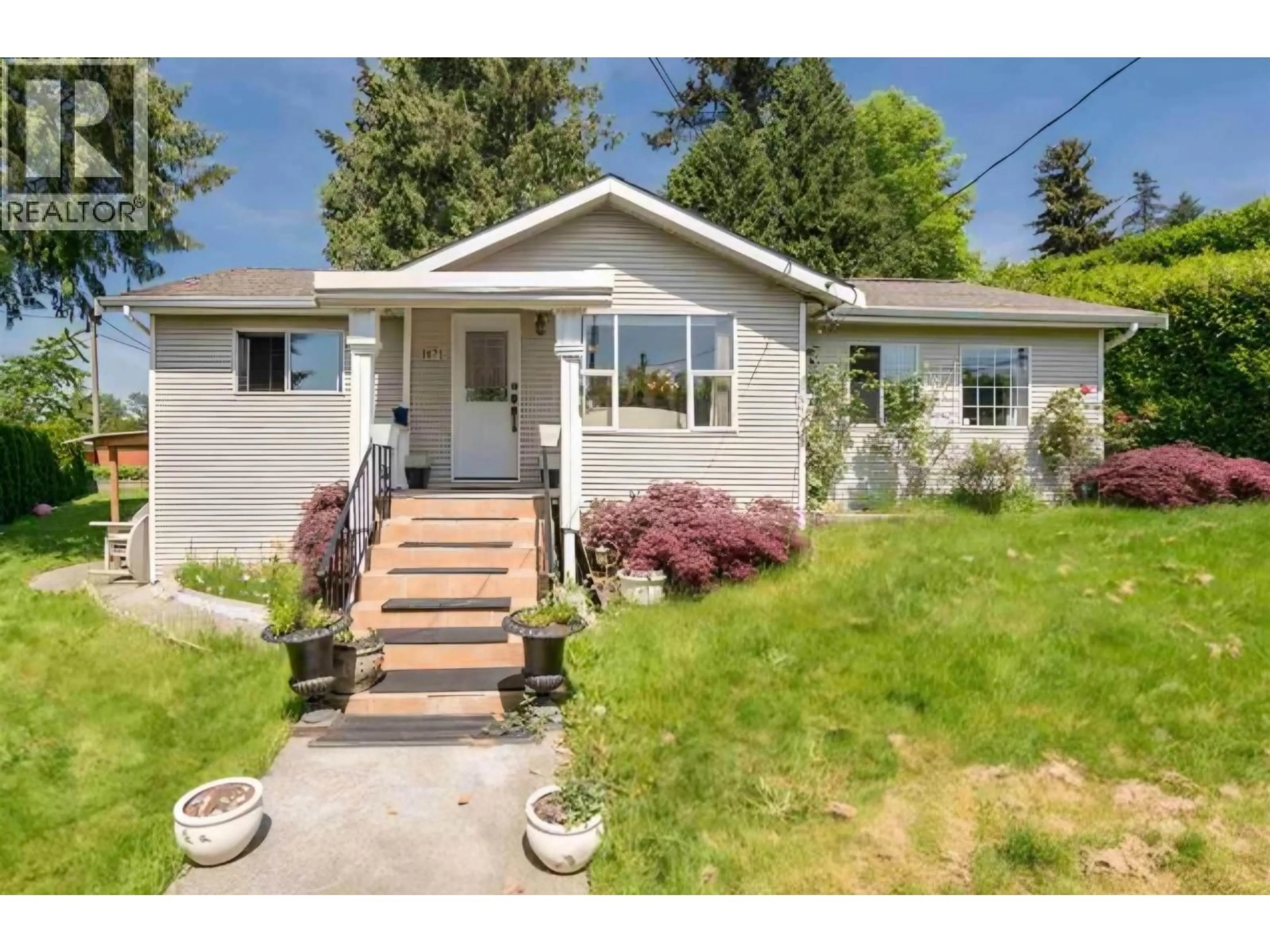 Home with vinyl exterior material, street for 1875 COLEMAN AVENUE, Coquitlam British Columbia V3K1B5