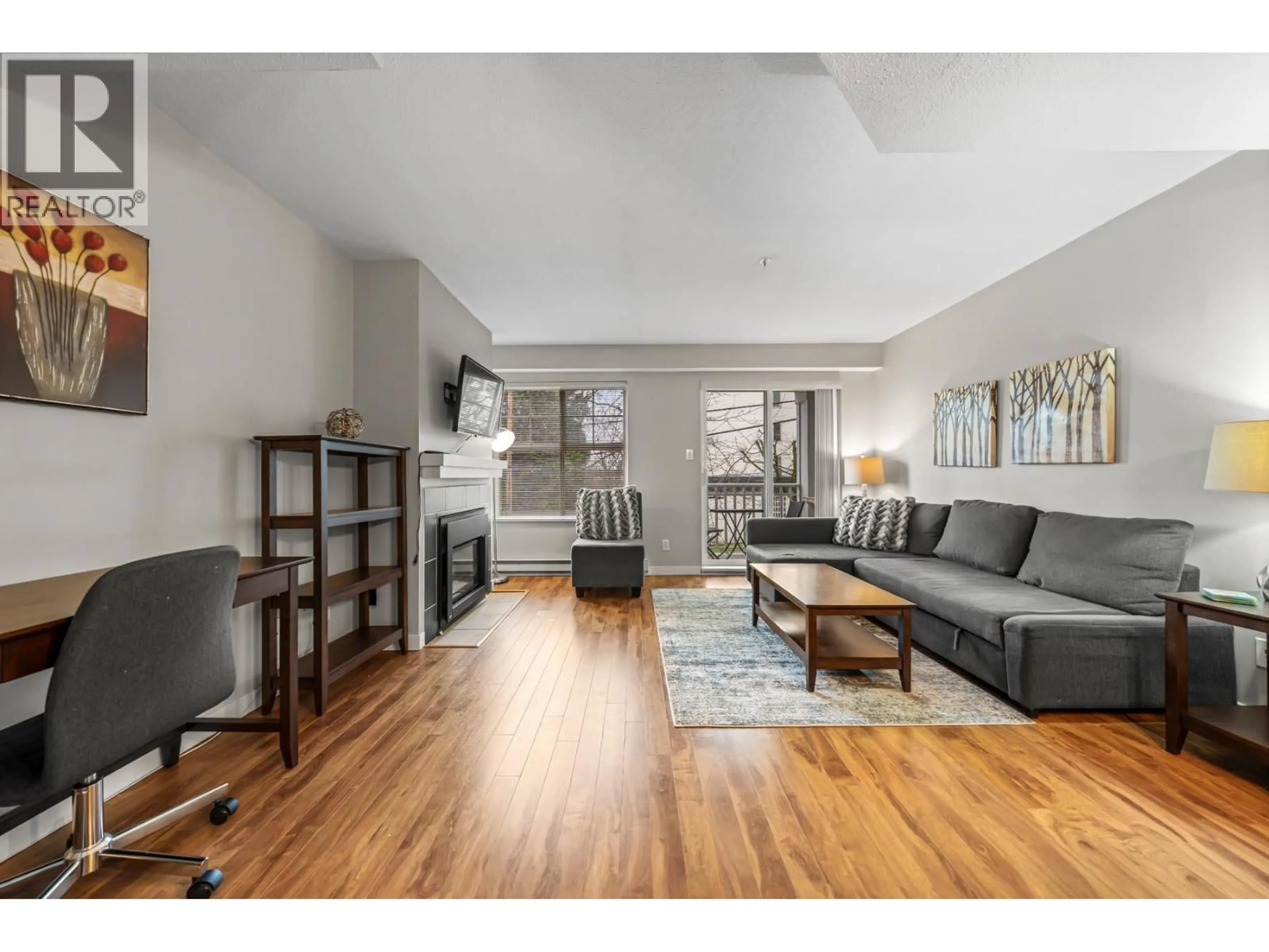 Living room with furniture, wood/laminate floor for 49 - 123 SEVENTH STREET, New Westminster British Columbia V3M6Y2