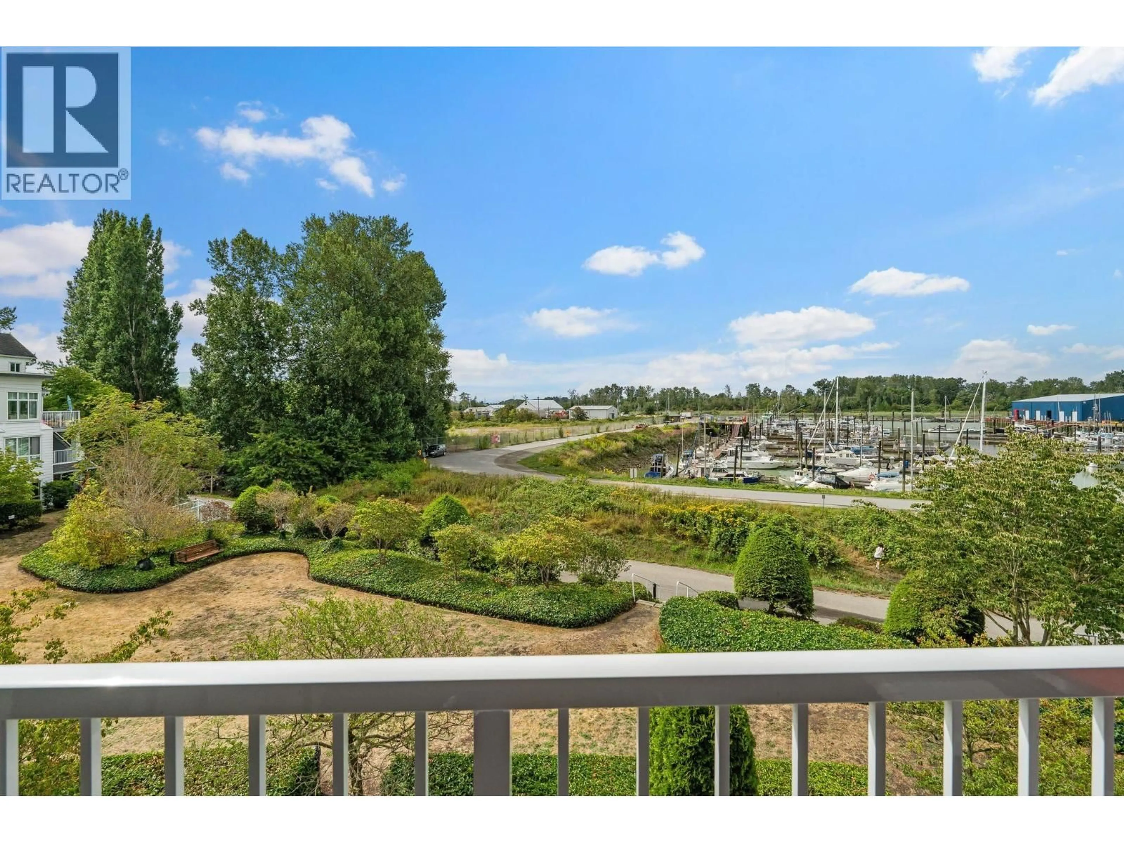A pic from outside/outdoor area/front of a property/back of a property/a pic from drone, water/lake/river/ocean view for 314 - 12639 NO. 2 ROAD, Richmond British Columbia V7E6N6