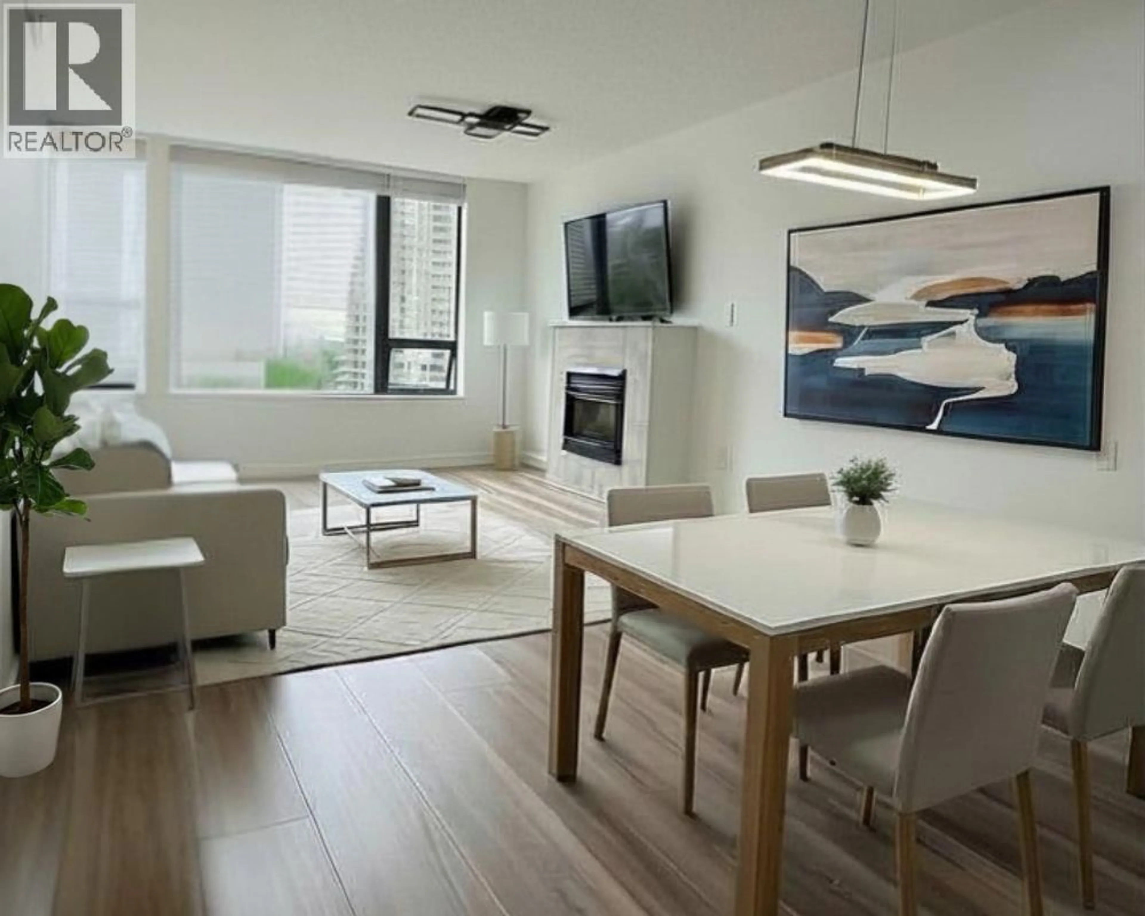 Living room with furniture, wood/laminate floor for 1107 - 4178 DAWSON STREET, Burnaby British Columbia V5C0A1