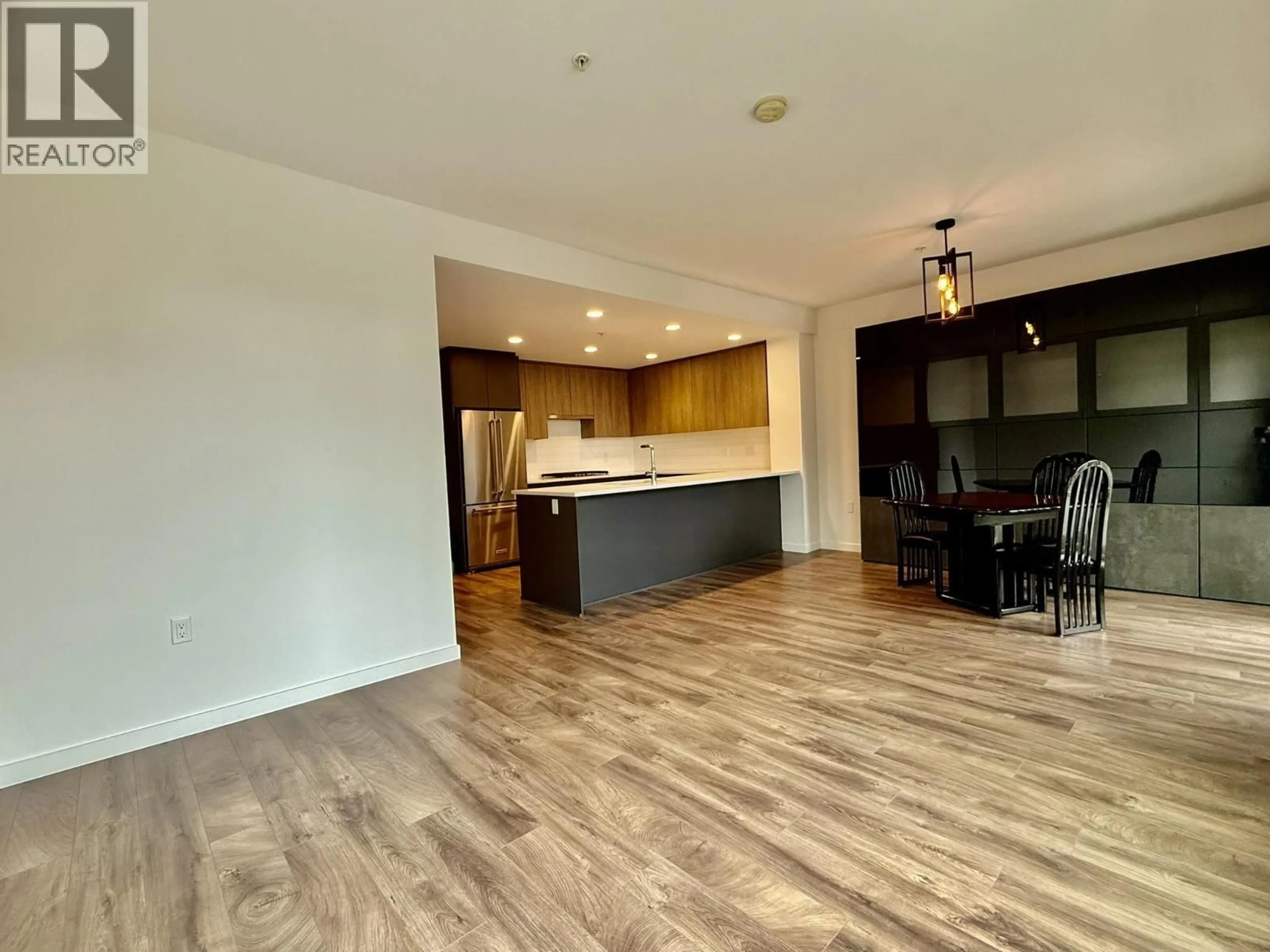 Open concept kitchen, wood/laminate floor for 312 - 621 REGAN AVENUE, Coquitlam British Columbia V3J0K1