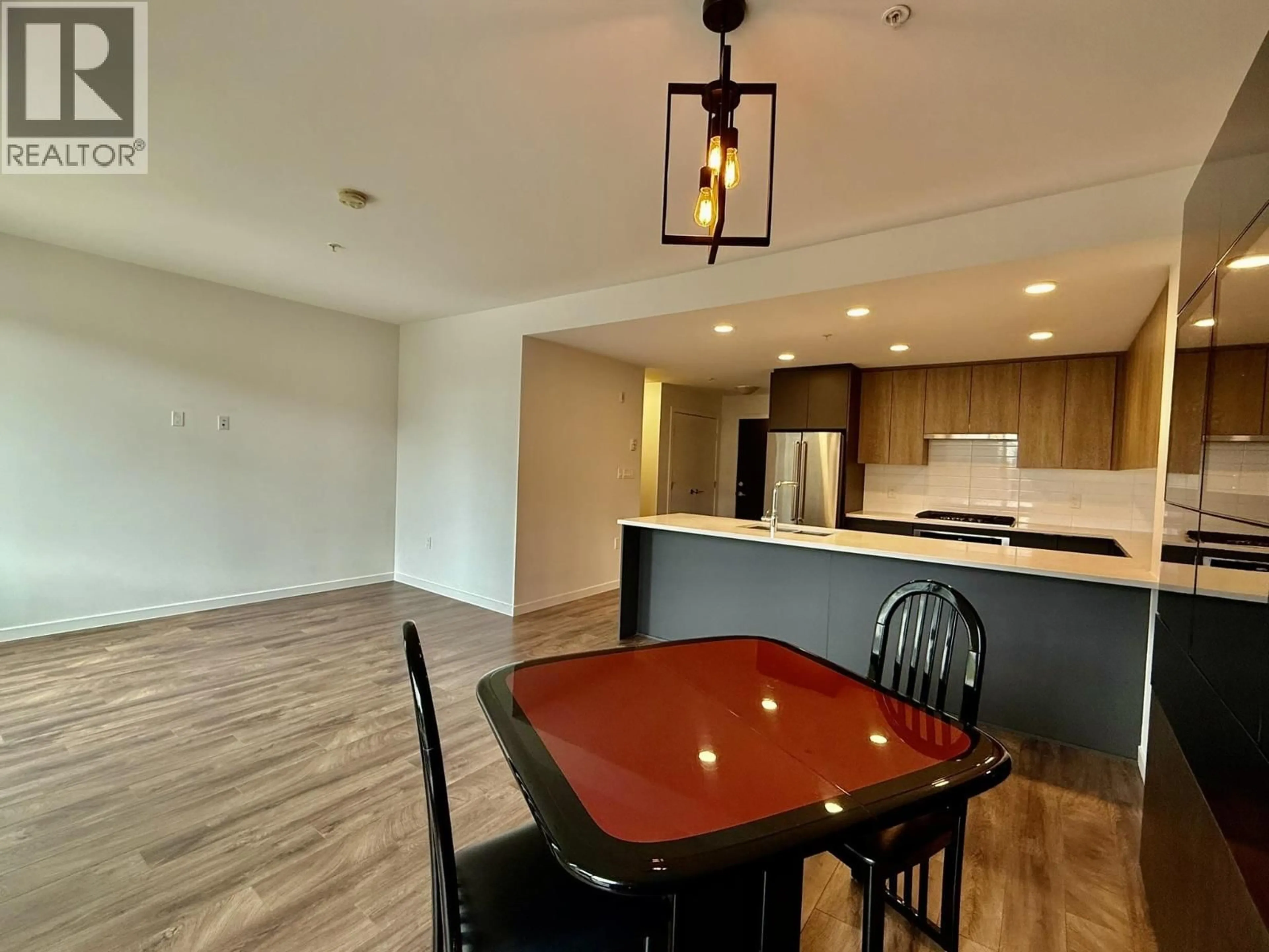 Open concept kitchen, wood/laminate floor for 312 - 621 REGAN AVENUE, Coquitlam British Columbia V3J0K1