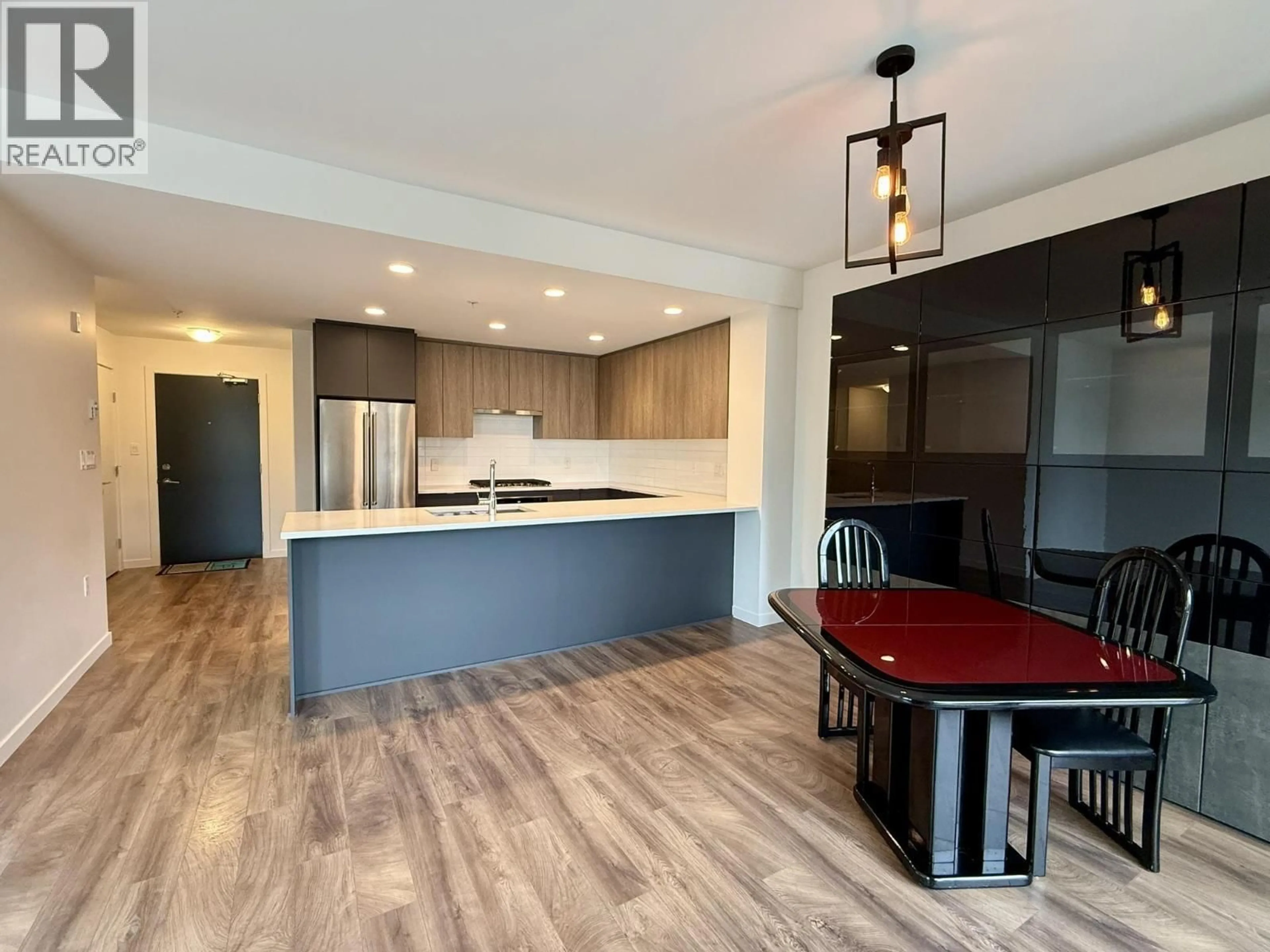 Open concept kitchen, wood/laminate floor for 312 - 621 REGAN AVENUE, Coquitlam British Columbia V3J0K1