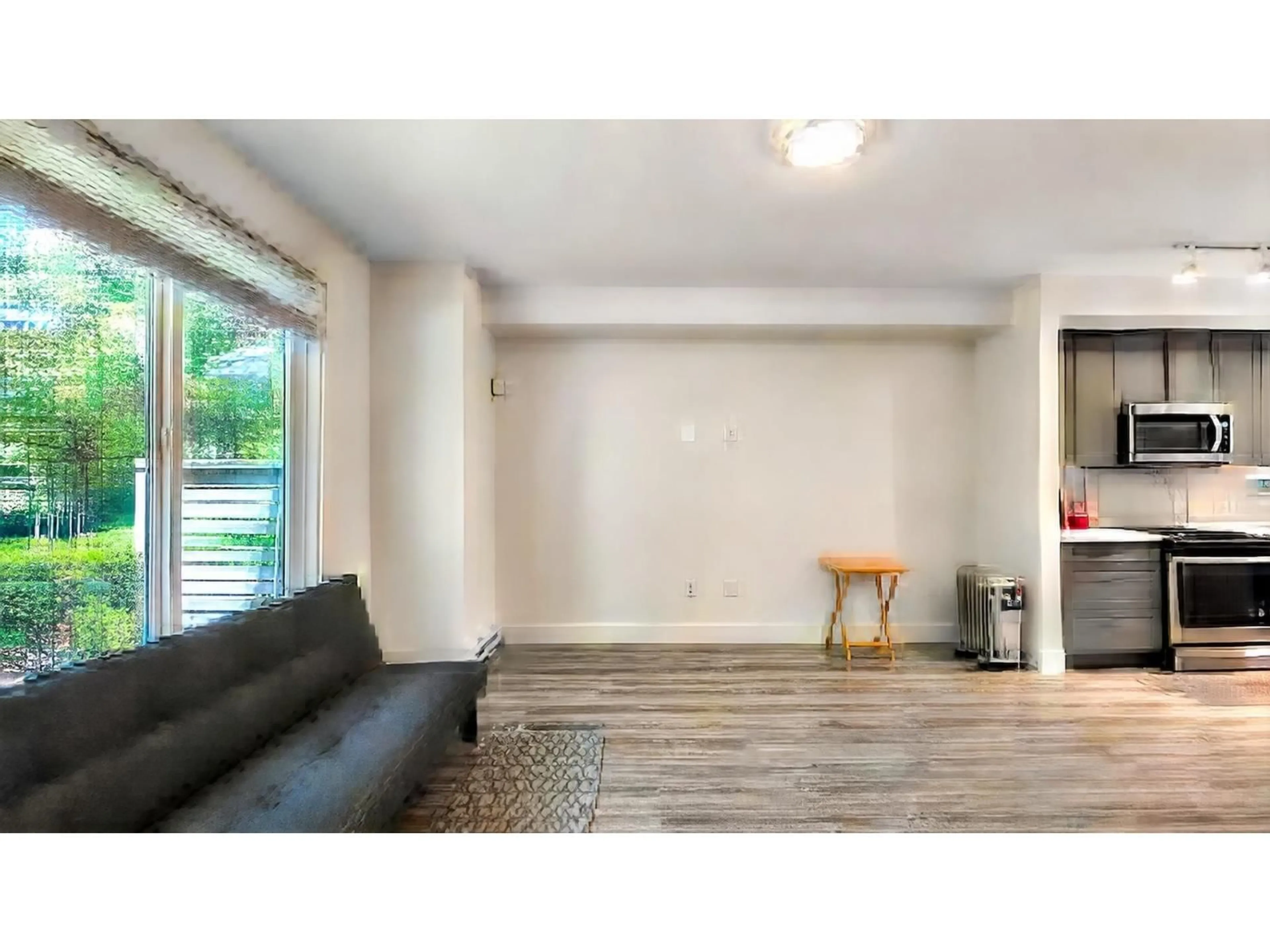 Living room with furniture, wood/laminate floor for 144 - 9718 161A STREET, Surrey British Columbia V4N6S7