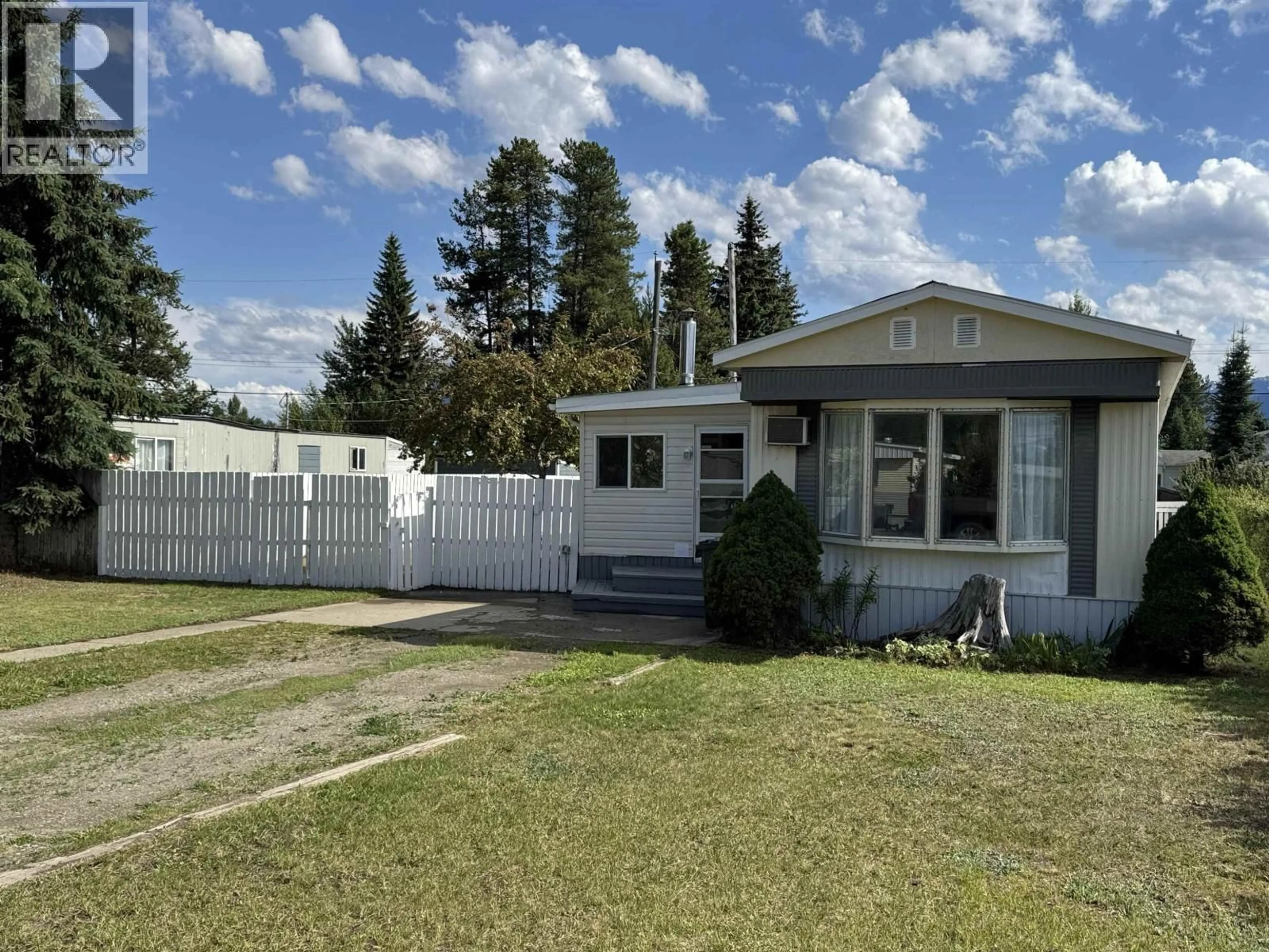 Home with vinyl exterior material, street for 1155 4TH AVENUE, Valemount British Columbia V0E2Z0