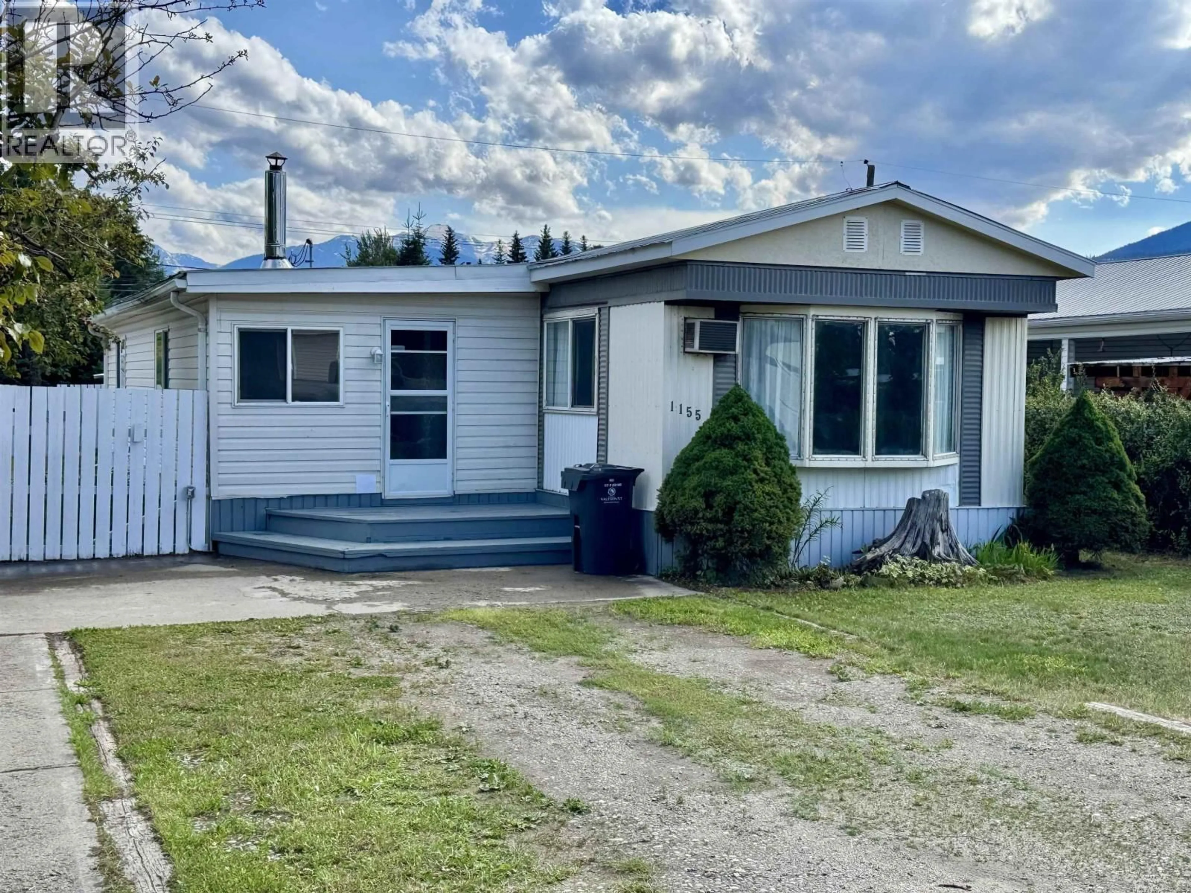 Home with vinyl exterior material, street for 1155 4TH AVENUE, Valemount British Columbia V0E2Z0