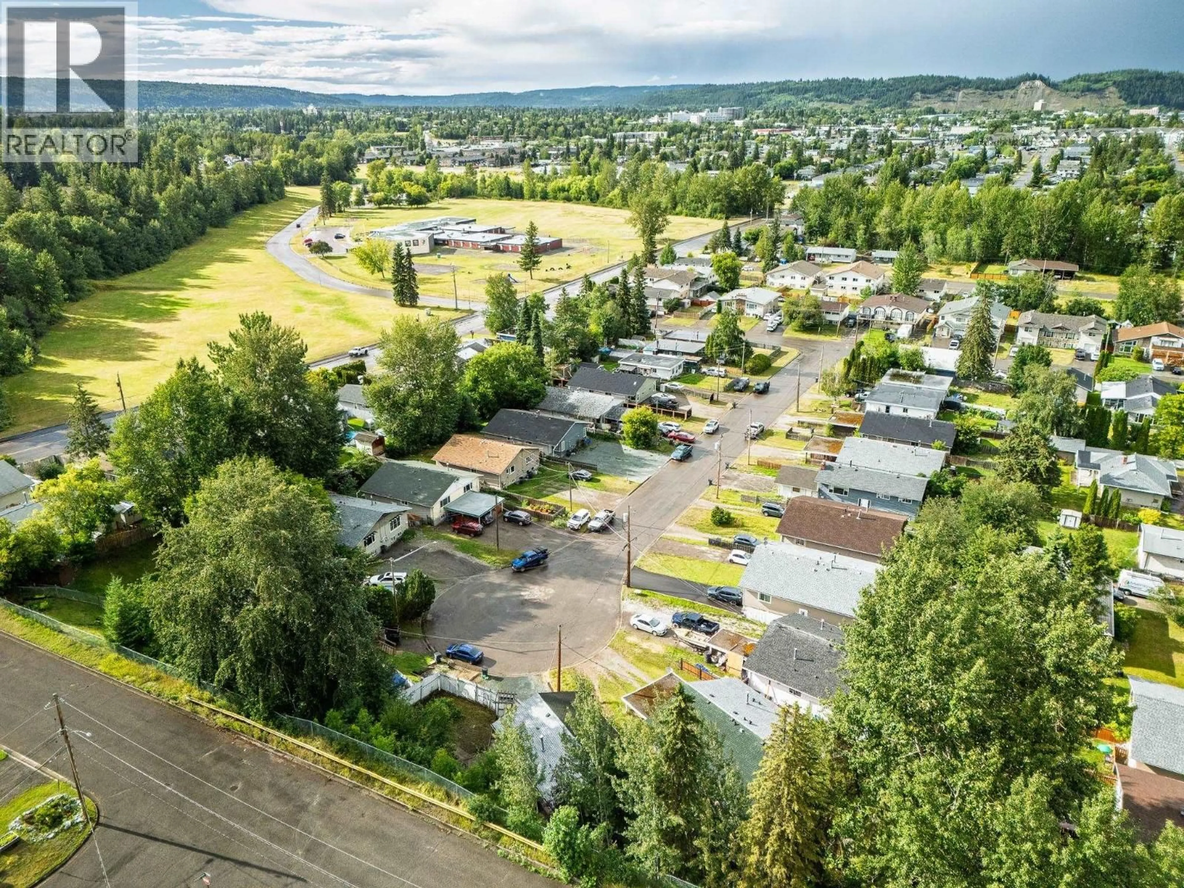 A pic from outside/outdoor area/front of a property/back of a property/a pic from drone, mountain view for 2650 QUINCE STREET, Prince George British Columbia V2L2H5