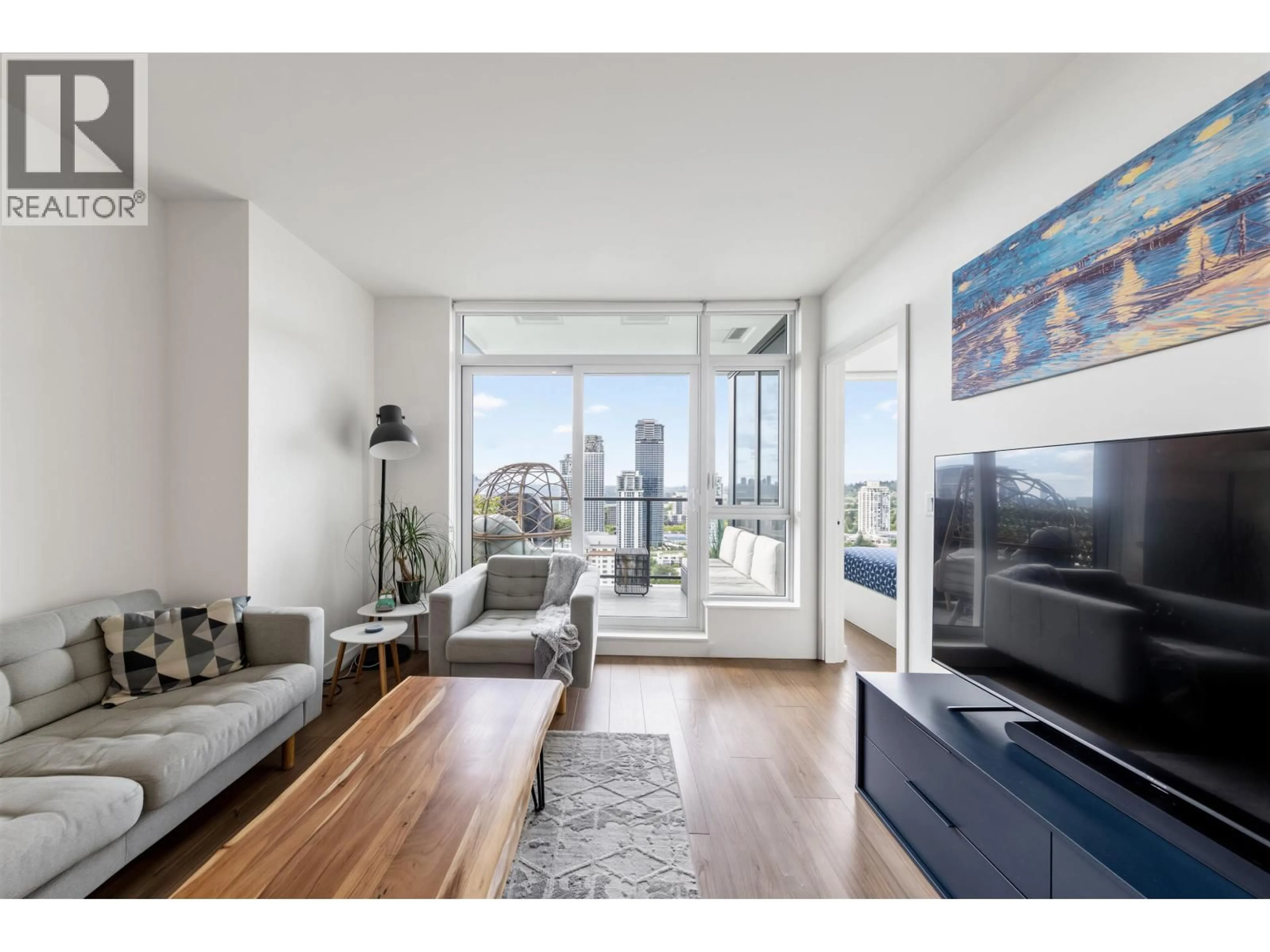 Living room with furniture, wood/laminate floor for 2507 - 595 AUSTIN AVENUE, Coquitlam British Columbia V3K0G7
