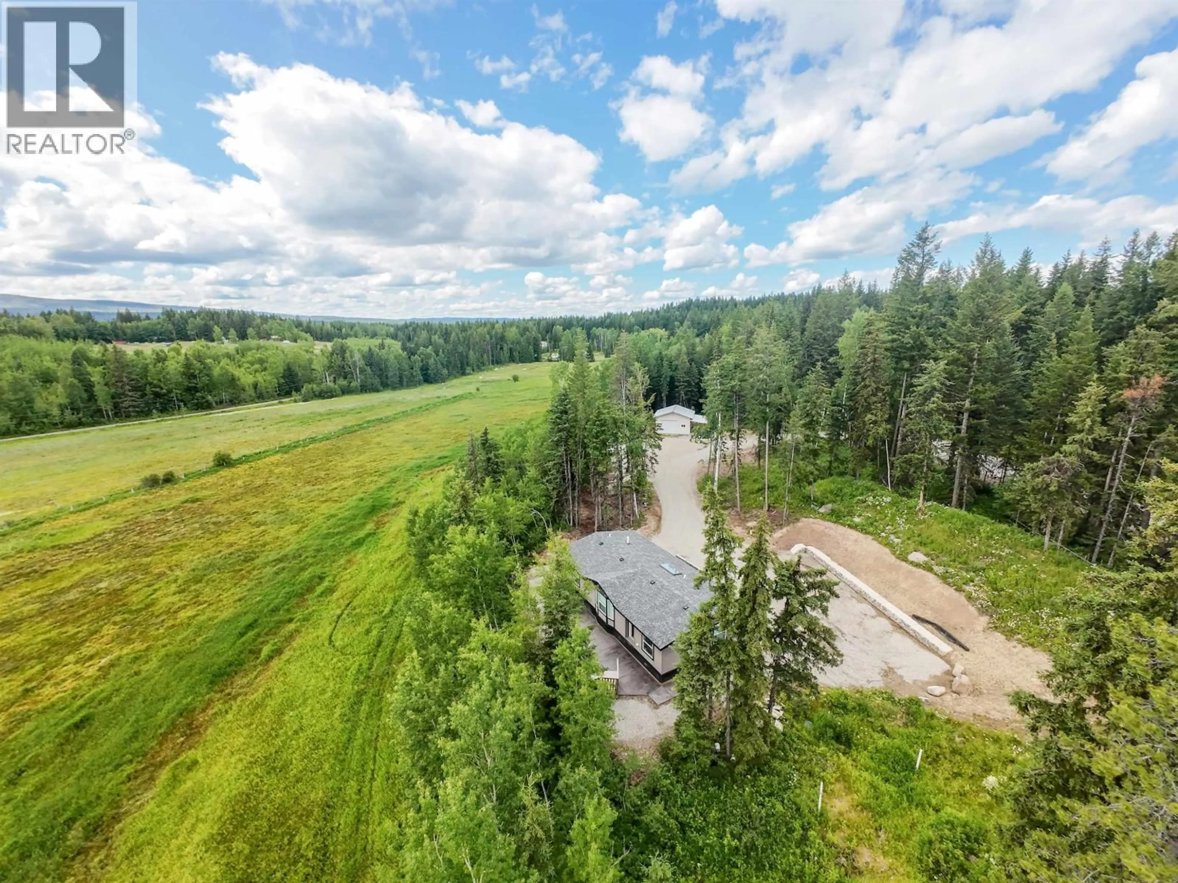 A pic from outside/outdoor area/front of a property/back of a property/a pic from drone, forest/trees view for 2281 BLACKWATER ROAD, Quesnel British Columbia V2J7C5