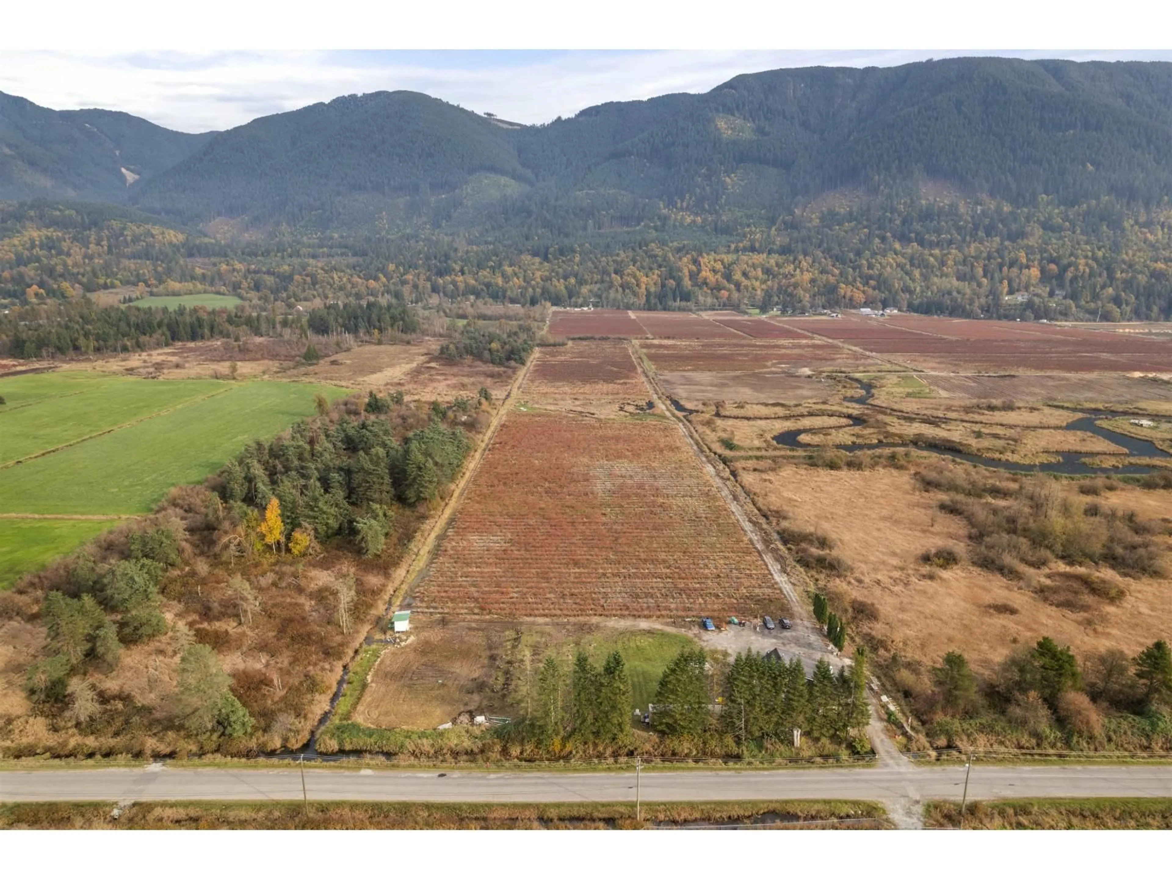 A pic from outside/outdoor area/front of a property/back of a property/a pic from drone, mountain view for 11186 FARMS ROAD, Mission British Columbia V2V4J1