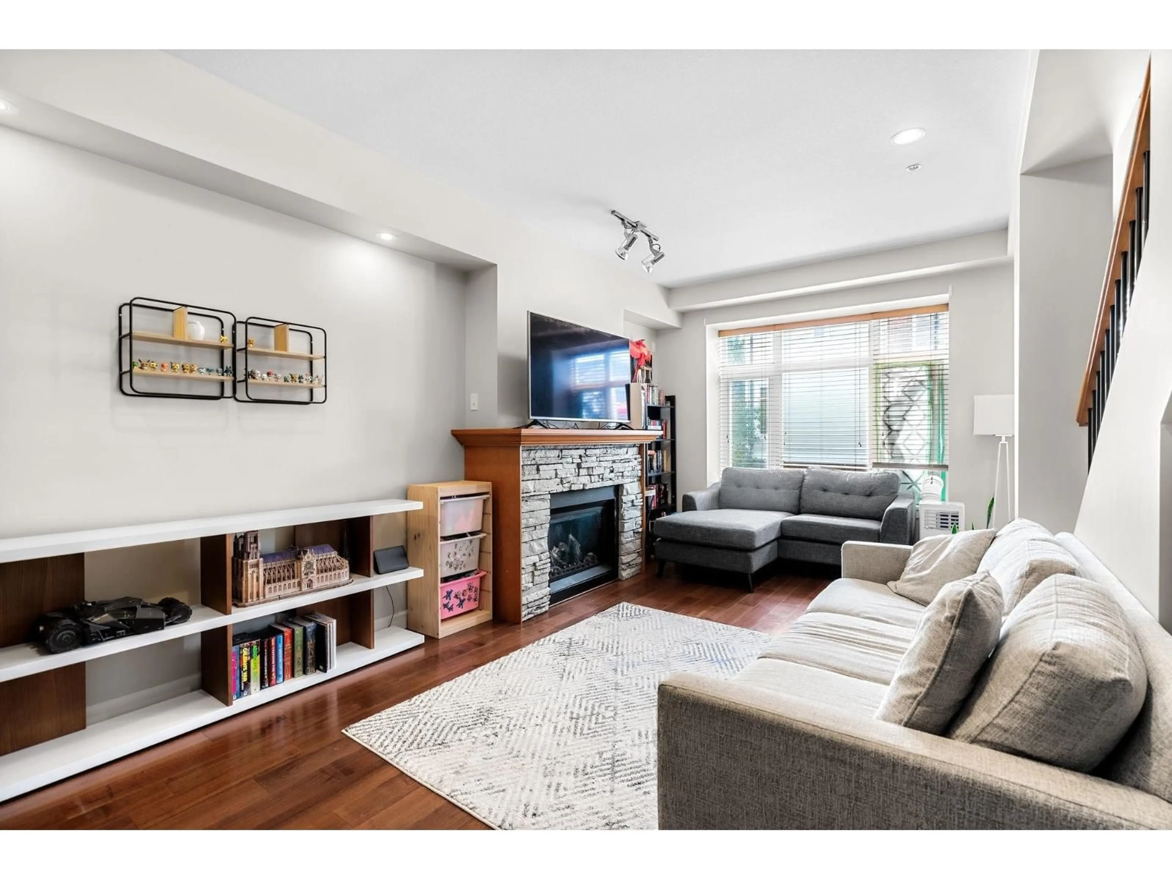Living room with furniture, wood/laminate floor for 112 - 20738 84 AVENUE, Langley British Columbia V2Y0J6