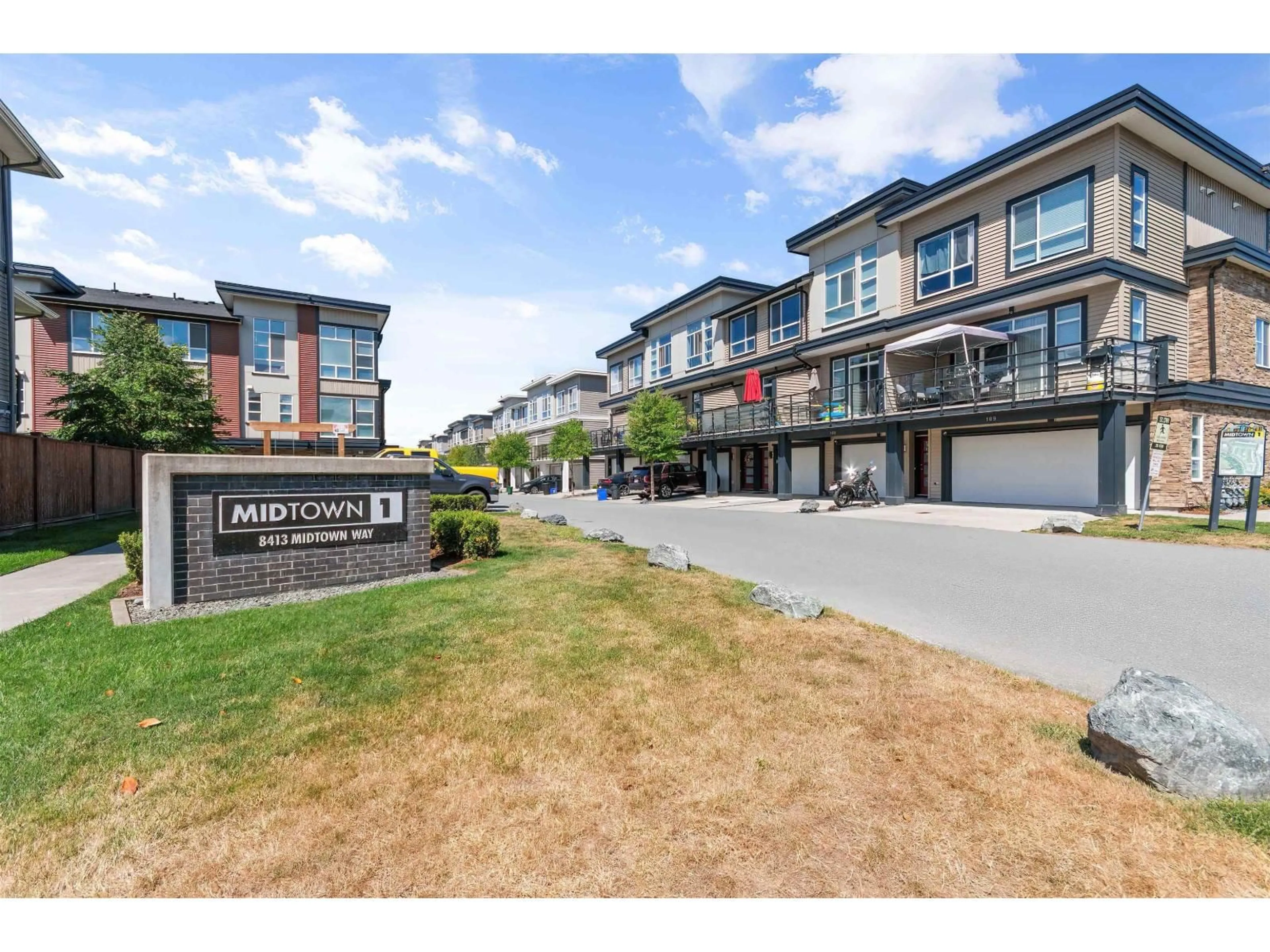 A pic from outside/outdoor area/front of a property/back of a property/a pic from drone, unknown for 107 - 8413 MIDTOWN WAY, Chilliwack British Columbia V2P0G7