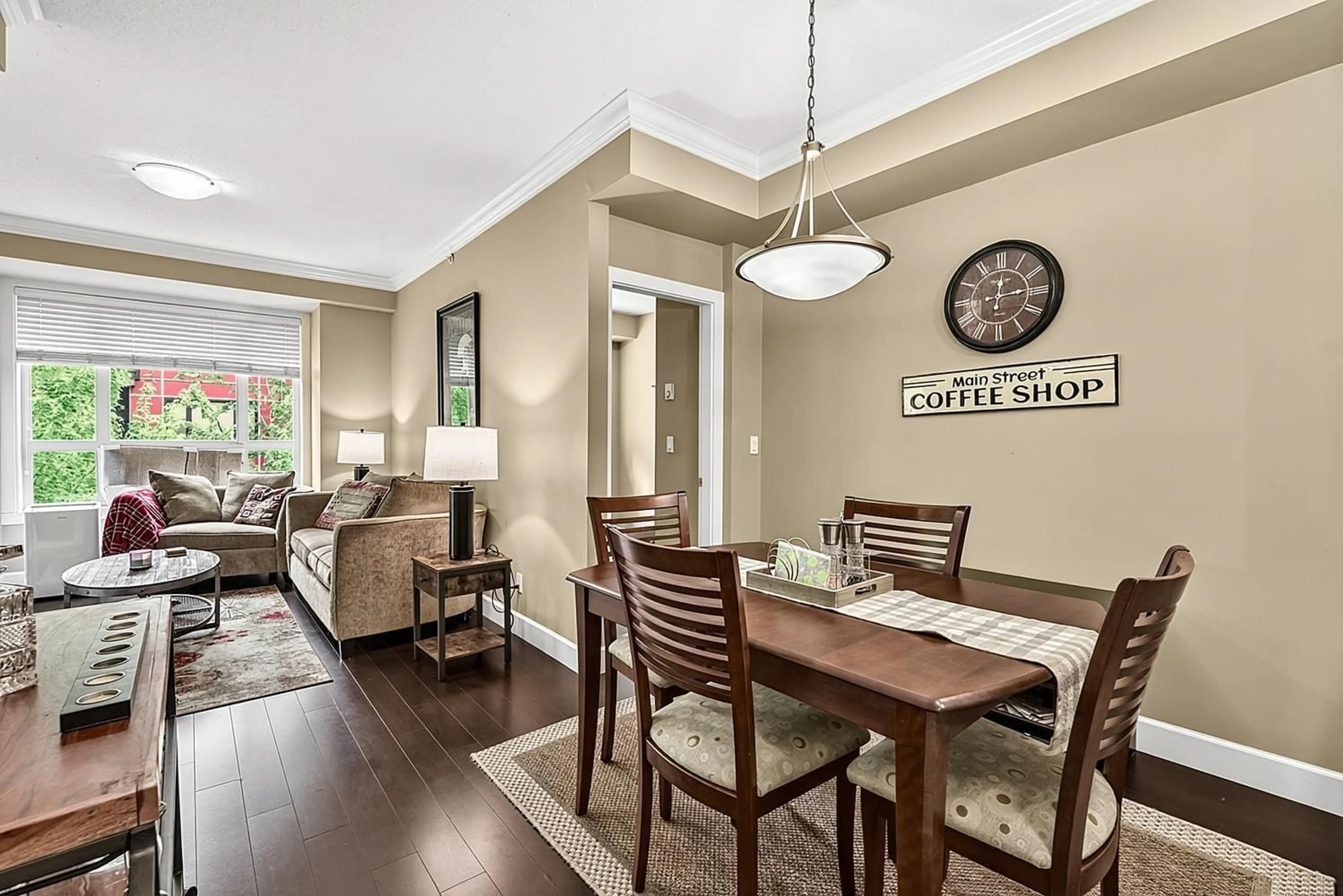 Dining room, wood/laminate floor for 411 - 13897 FRASER HIGHWAY, Surrey British Columbia V3T0G8