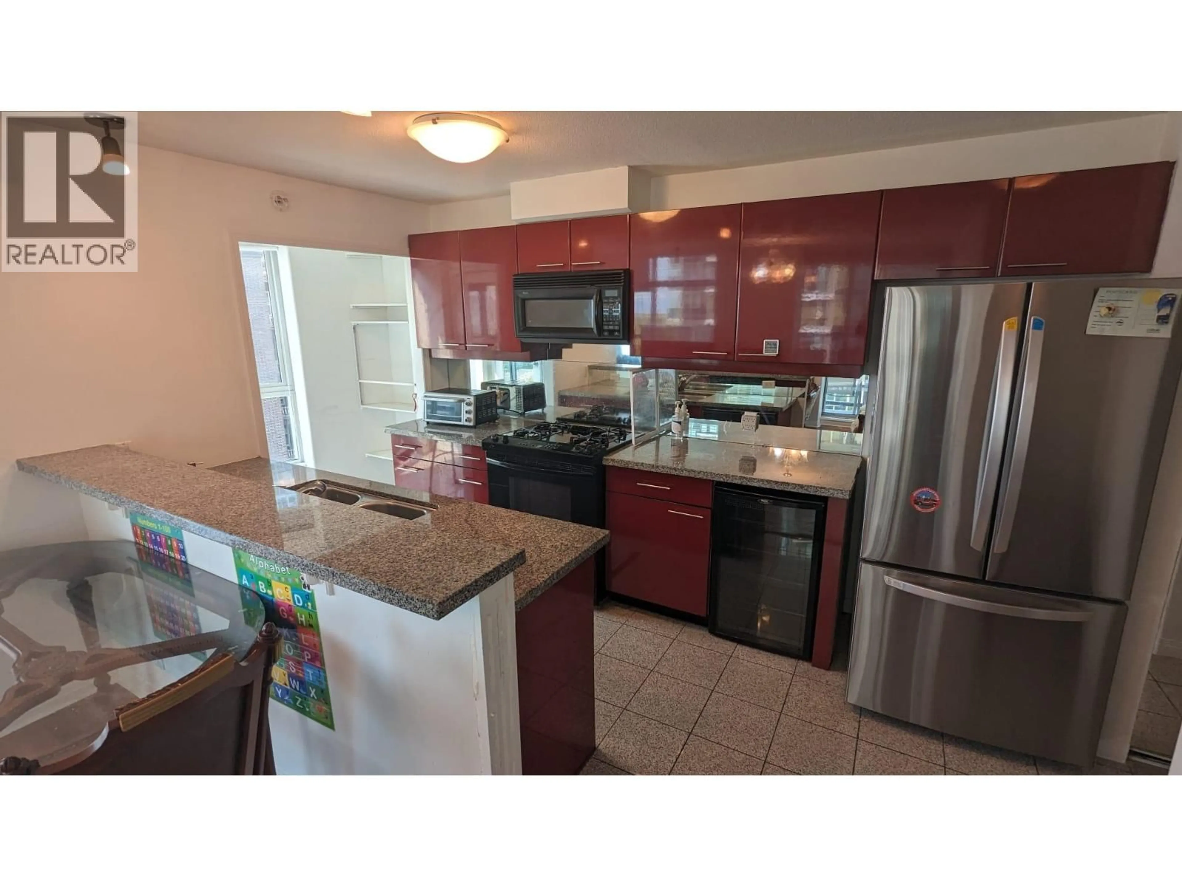 Open concept kitchen, ceramic/tile floor for 907 - 1328 PENDER STREET, Vancouver British Columbia V6E4T1