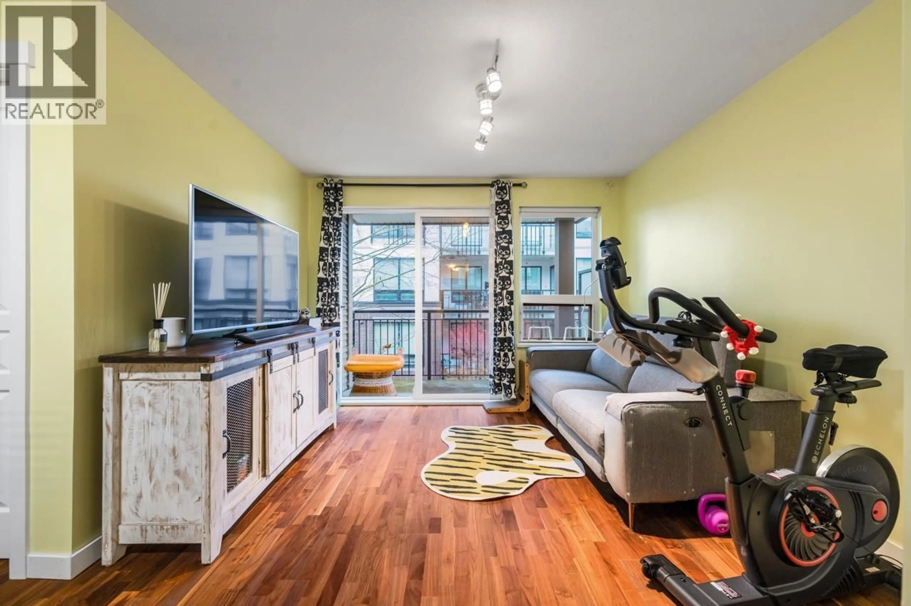 Living room with furniture, wood/laminate floor for 330 - 9500 ODLIN ROAD, Richmond British Columbia V6X1C9