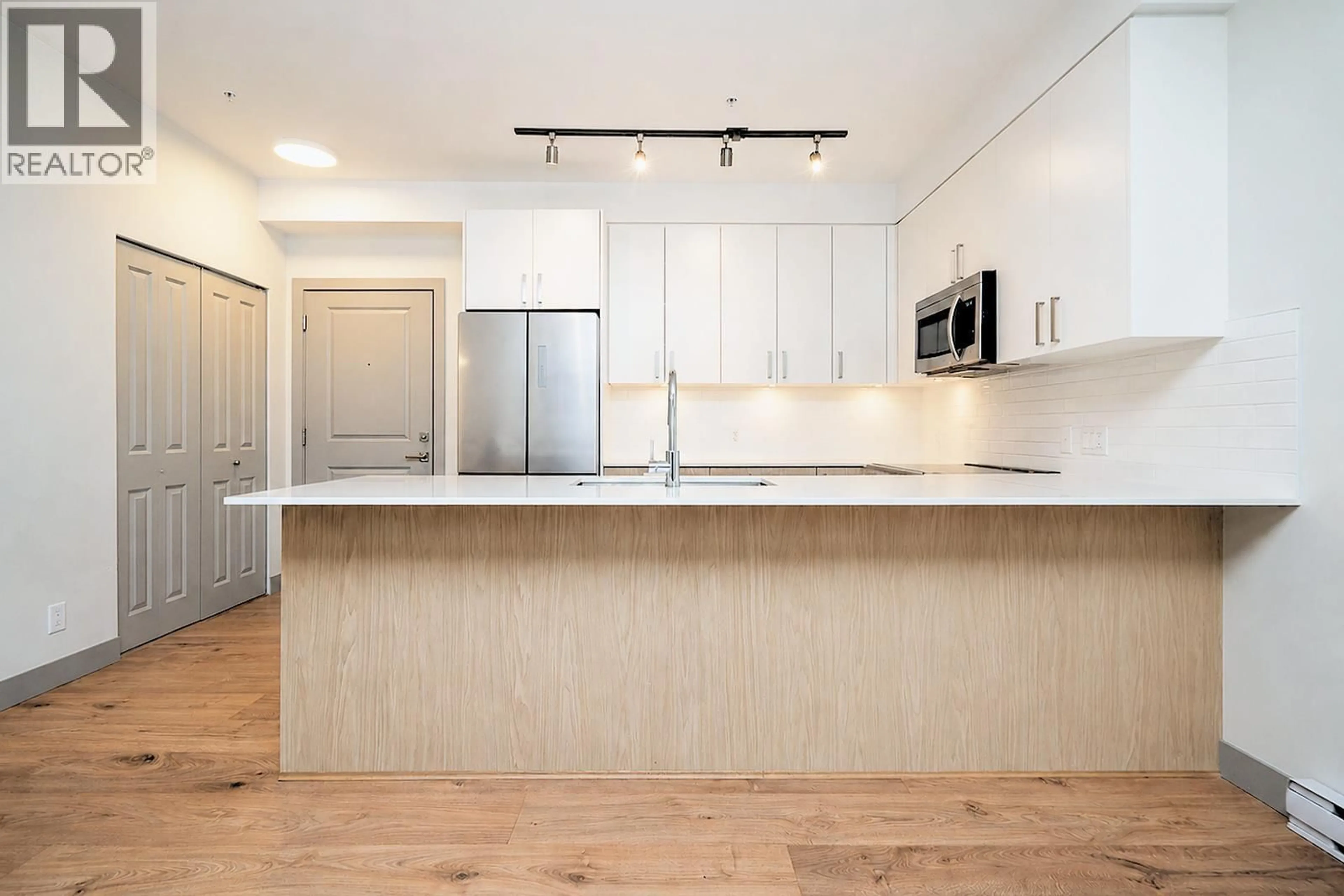 Open concept kitchen, unknown for 210 - 6968 ROYAL OAK AVENUE, Burnaby British Columbia V5J4J2