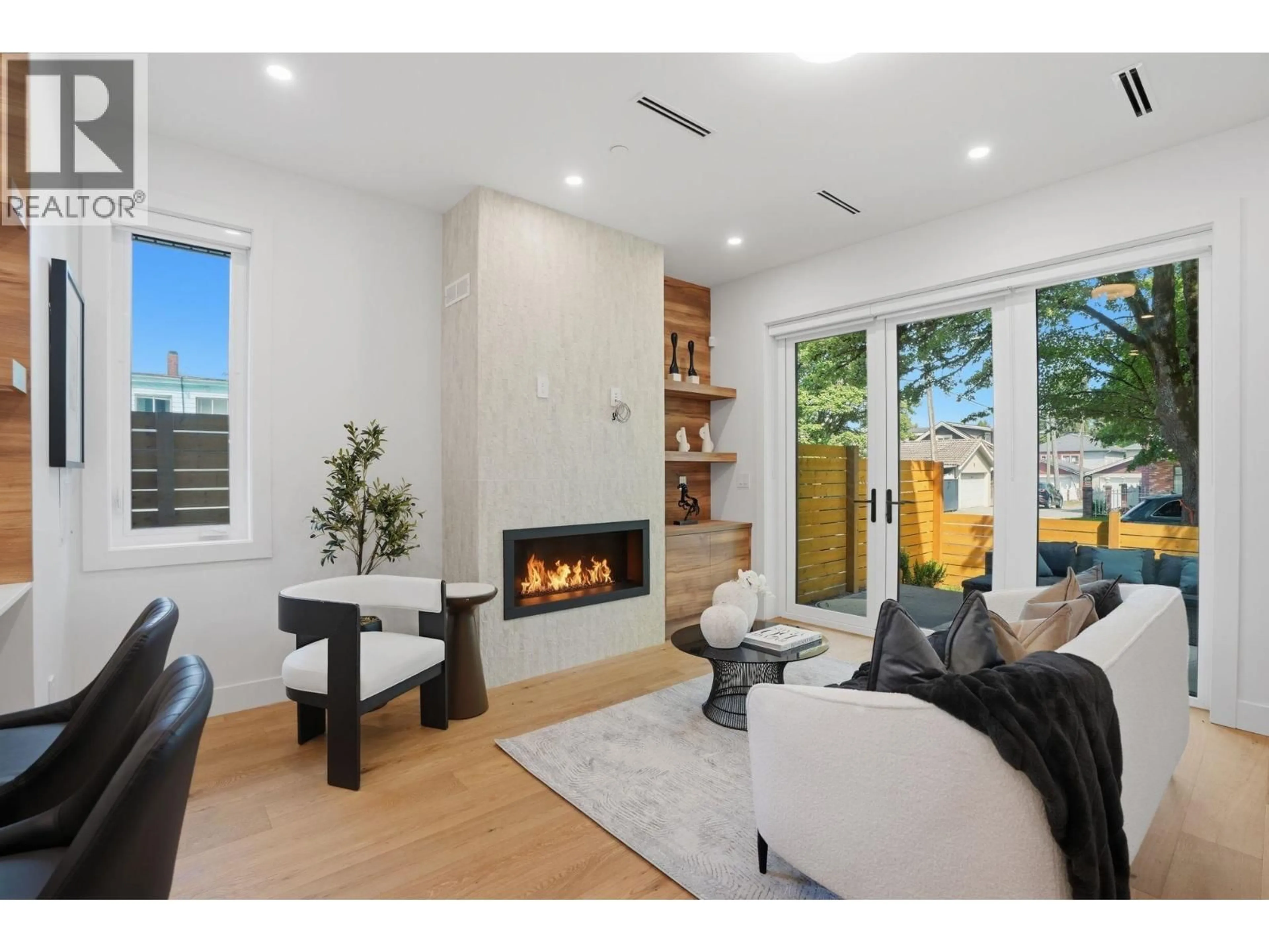 Living room with furniture, ceramic/tile floor for 1 - 2438 20TH AVENUE, Vancouver British Columbia V5M2T6
