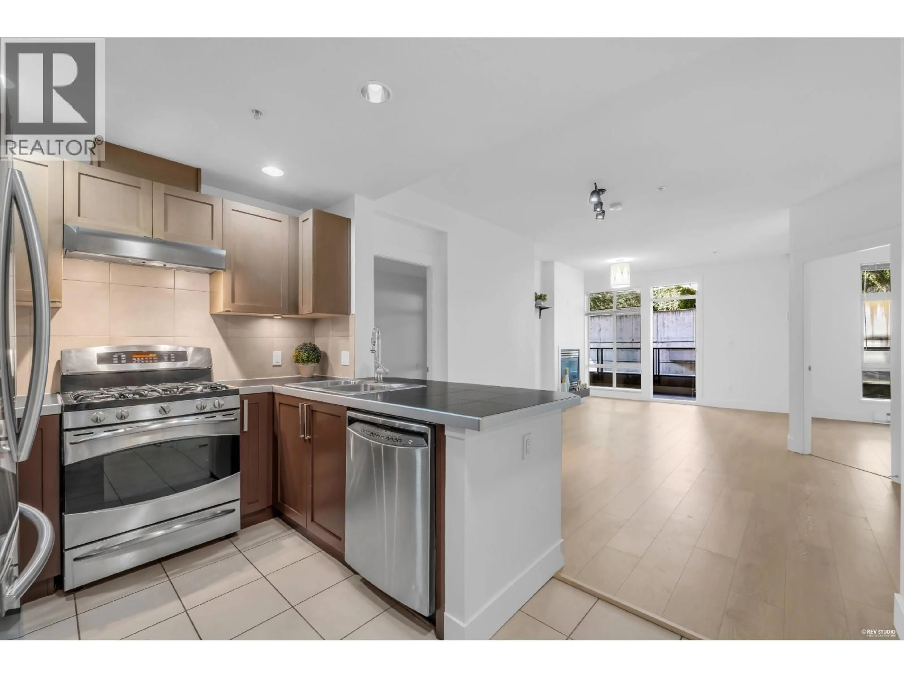 Open concept kitchen, ceramic/tile floor for 120 - 5777 BIRNEY AVENUE, Vancouver British Columbia V6S0A4