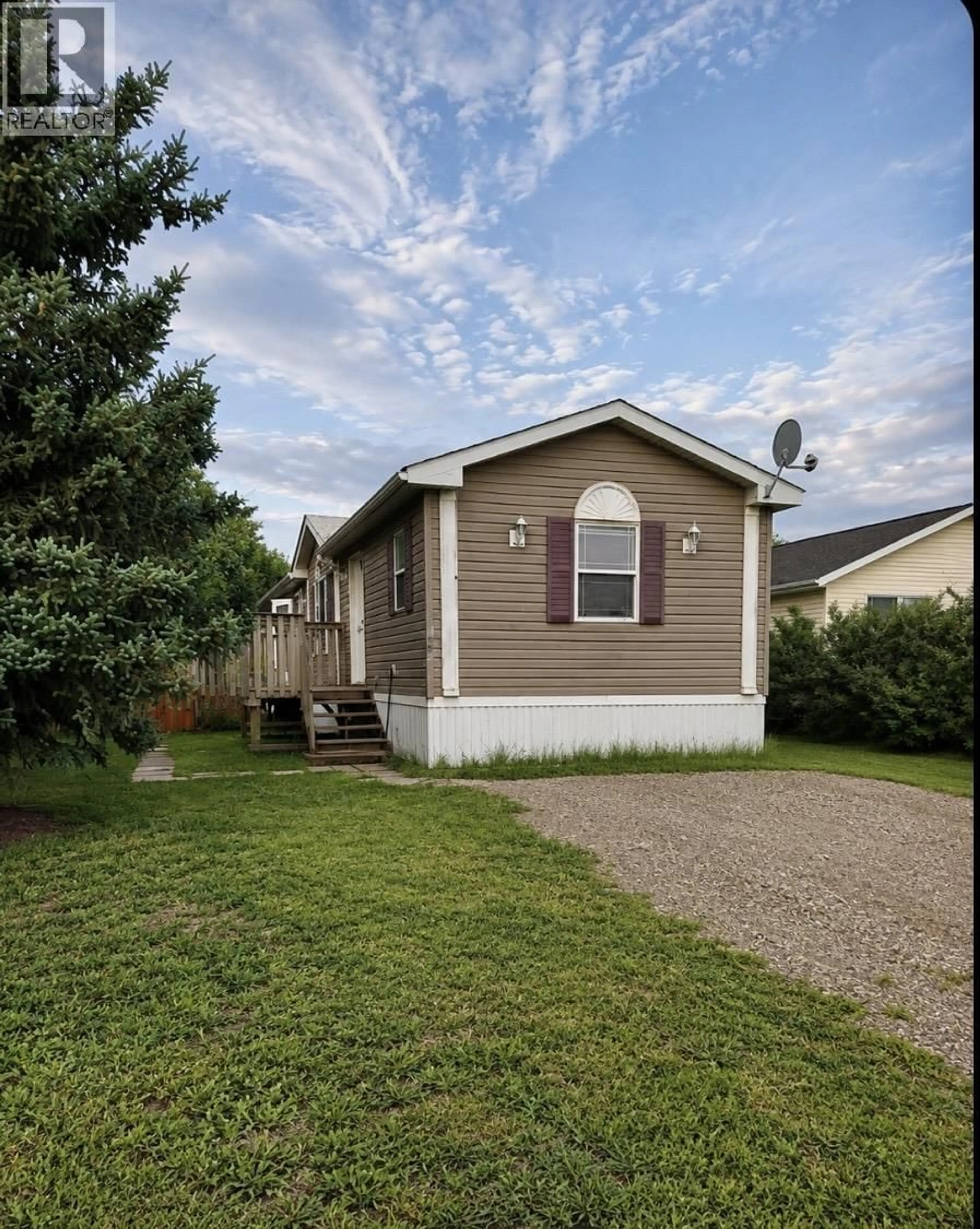 Home with vinyl exterior material, street for 10055 100A STREET, Taylor British Columbia V0C2K0