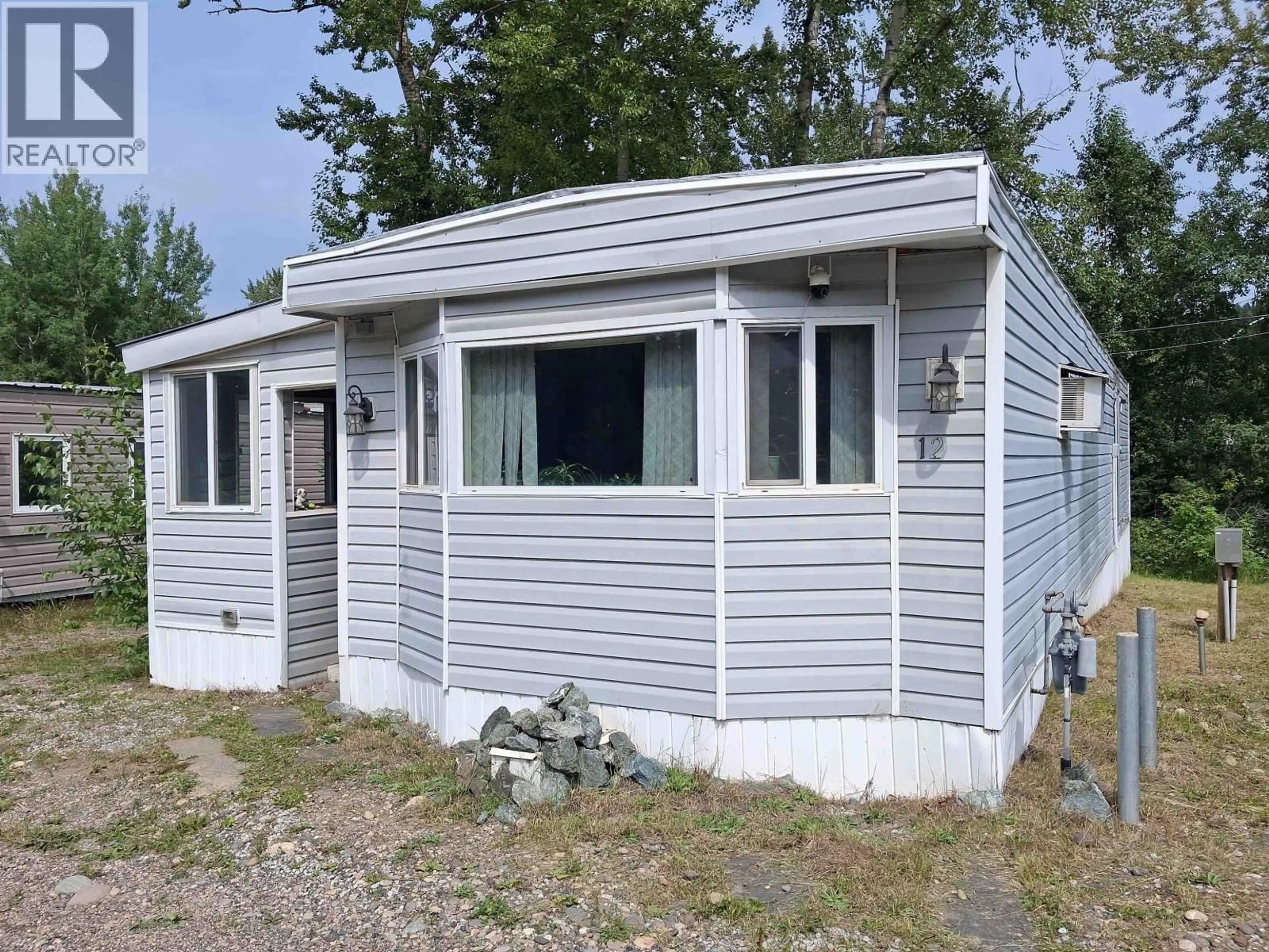 Home with vinyl exterior material, building for 12 - 7128 OTWAY ROAD, Prince George British Columbia V2M7E1