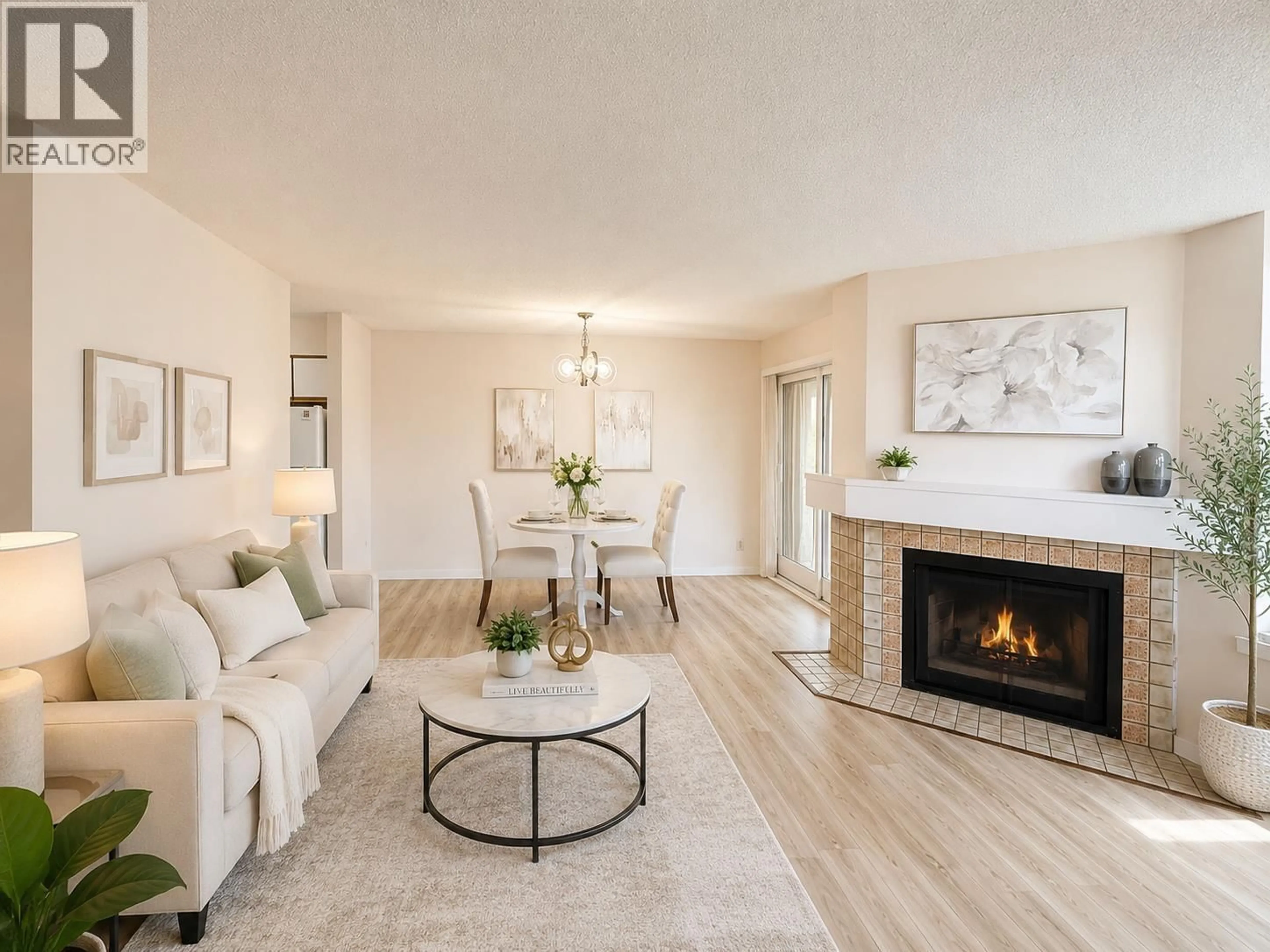 Living room with furniture, wood/laminate floor for 103 - 5025 SANDERS STREET, Burnaby British Columbia V5H1S8