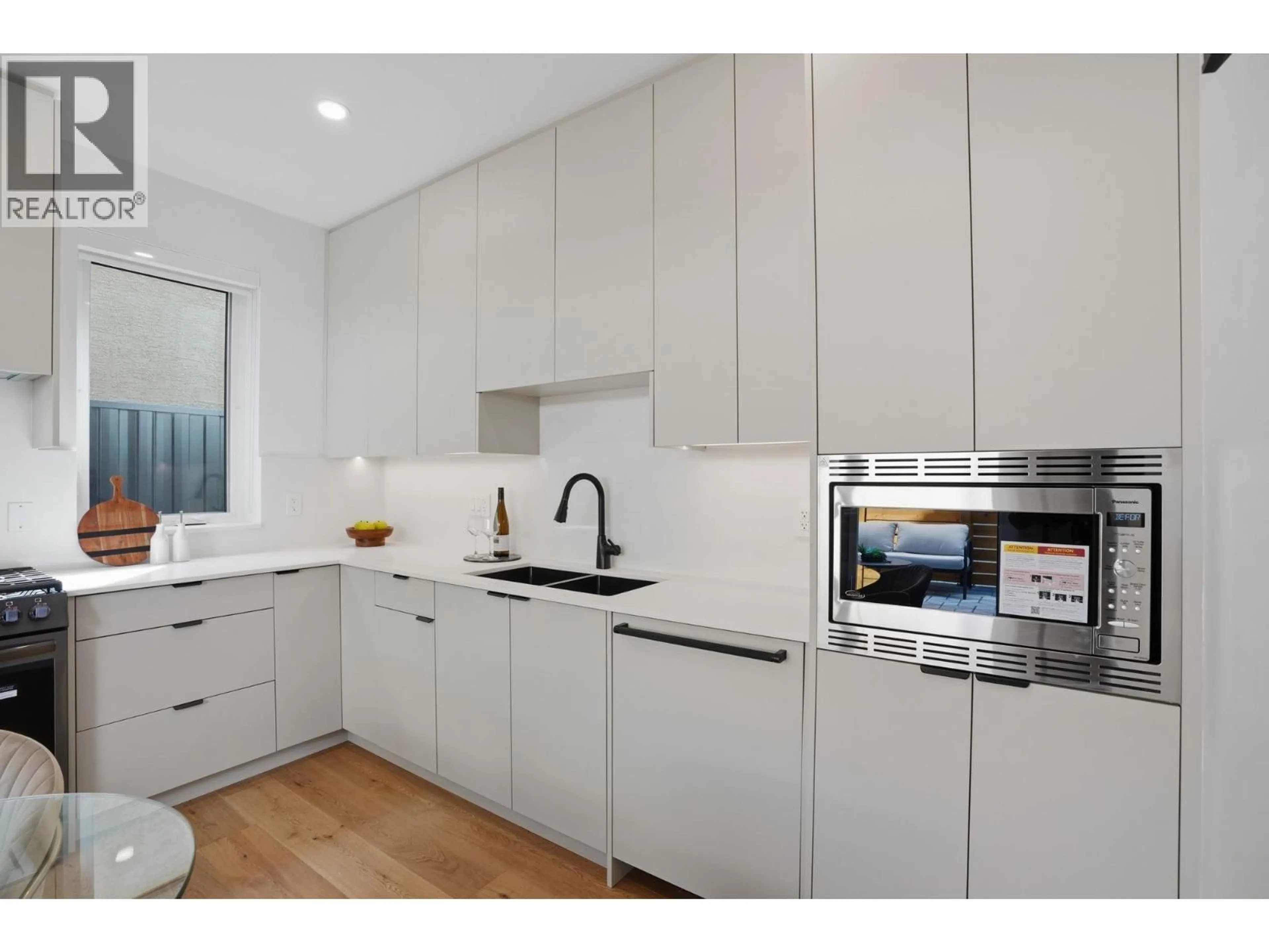 Contemporary kitchen, unknown for 2436 20TH AVENUE, Vancouver British Columbia V5M2T6