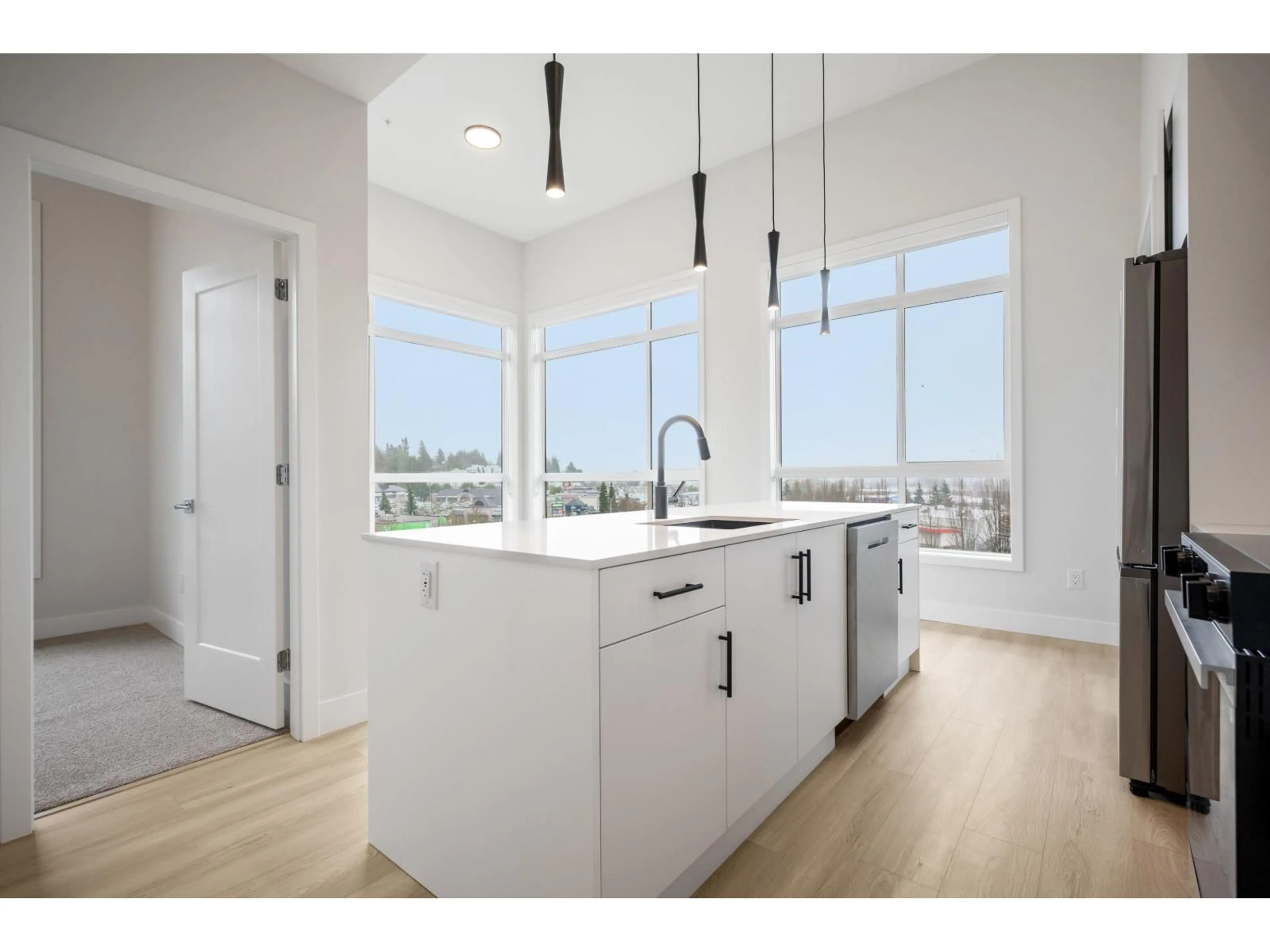 Open concept kitchen, unknown for 205 - 34395 GLADYS AVENUE, Abbotsford British Columbia V2S0R4