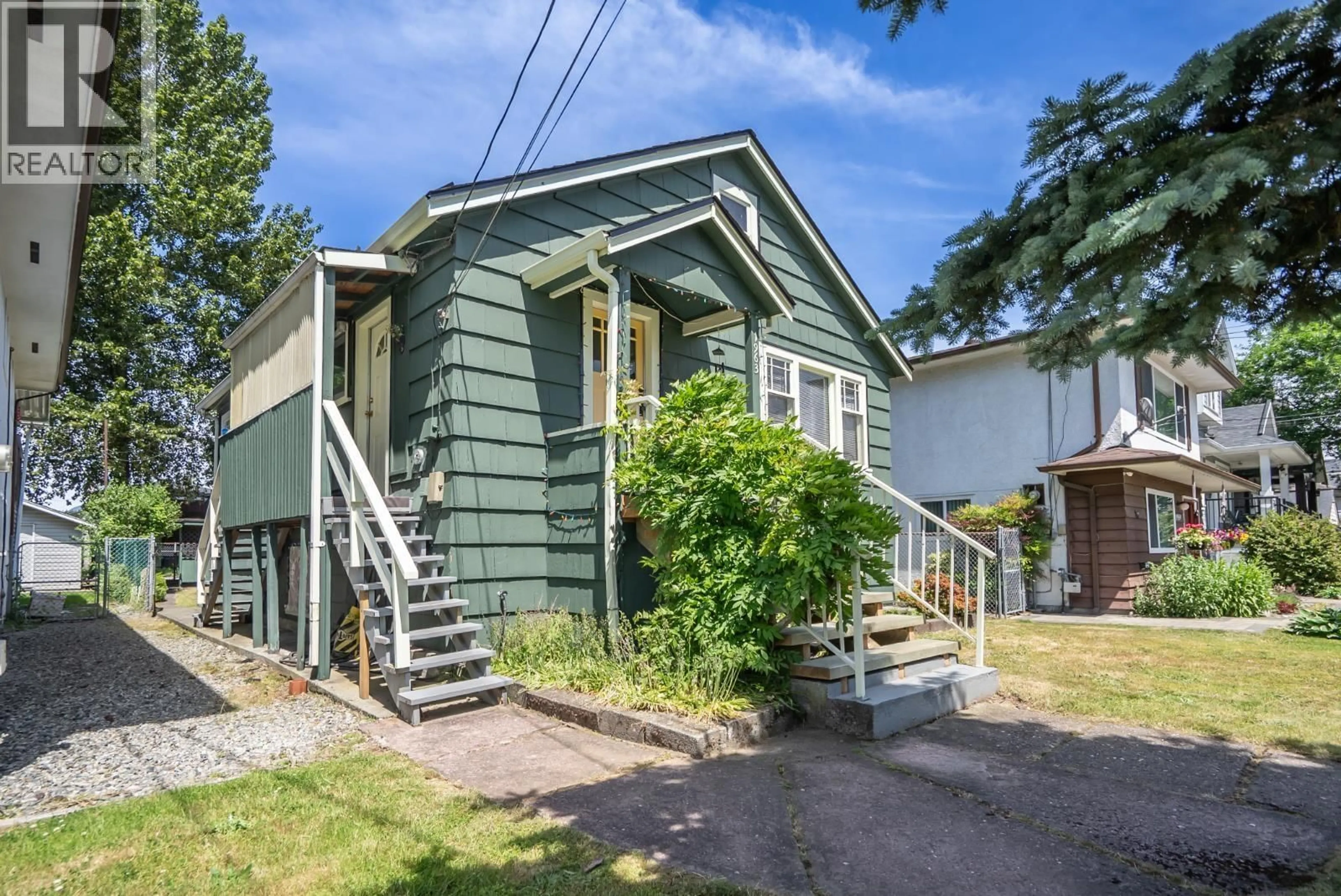 Home with vinyl exterior material, street for 1963 FRASER AVENUE, Port Coquitlam British Columbia V3B1N4
