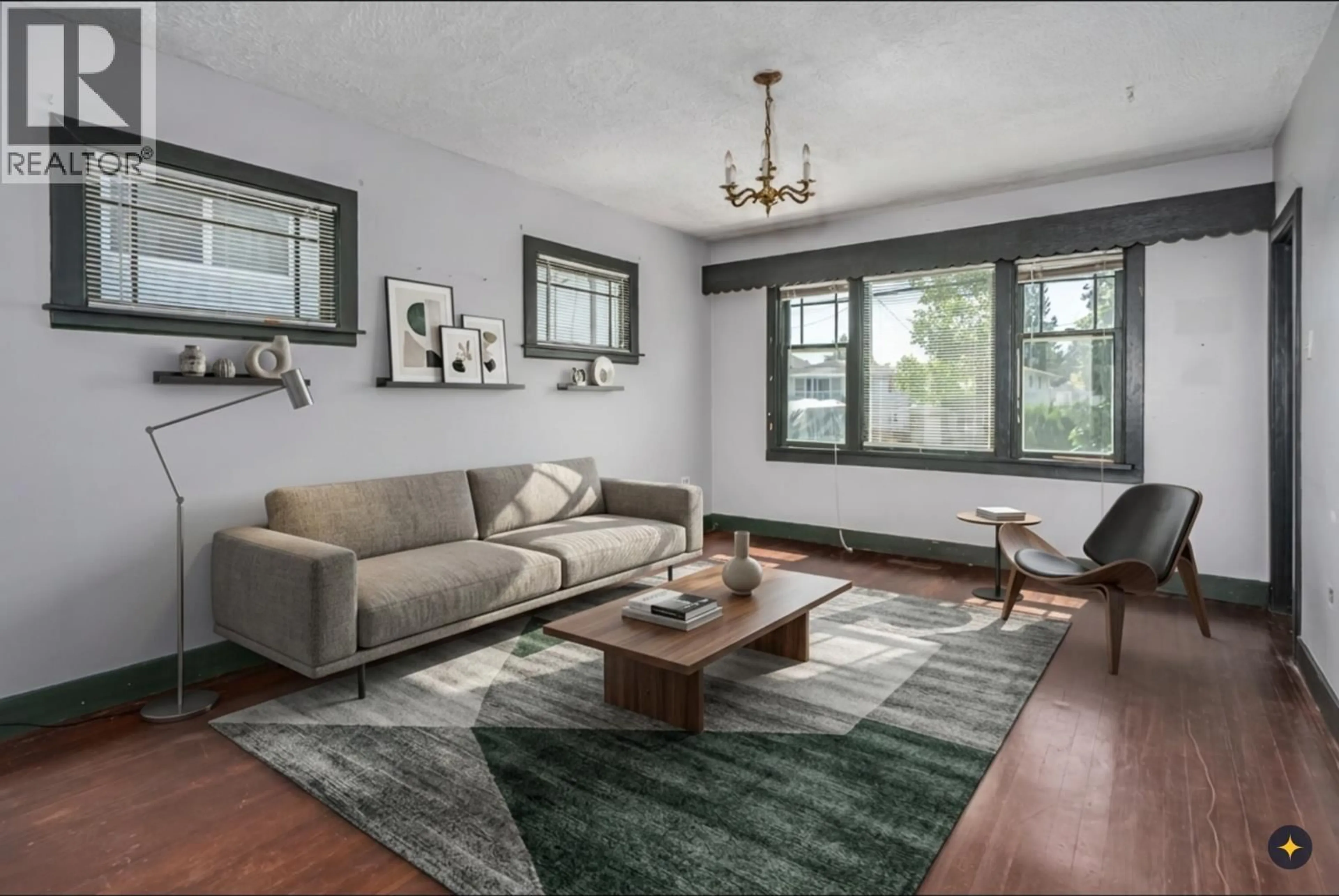 Living room with furniture, wood/laminate floor for 1963 FRASER AVENUE, Port Coquitlam British Columbia V3B1N4