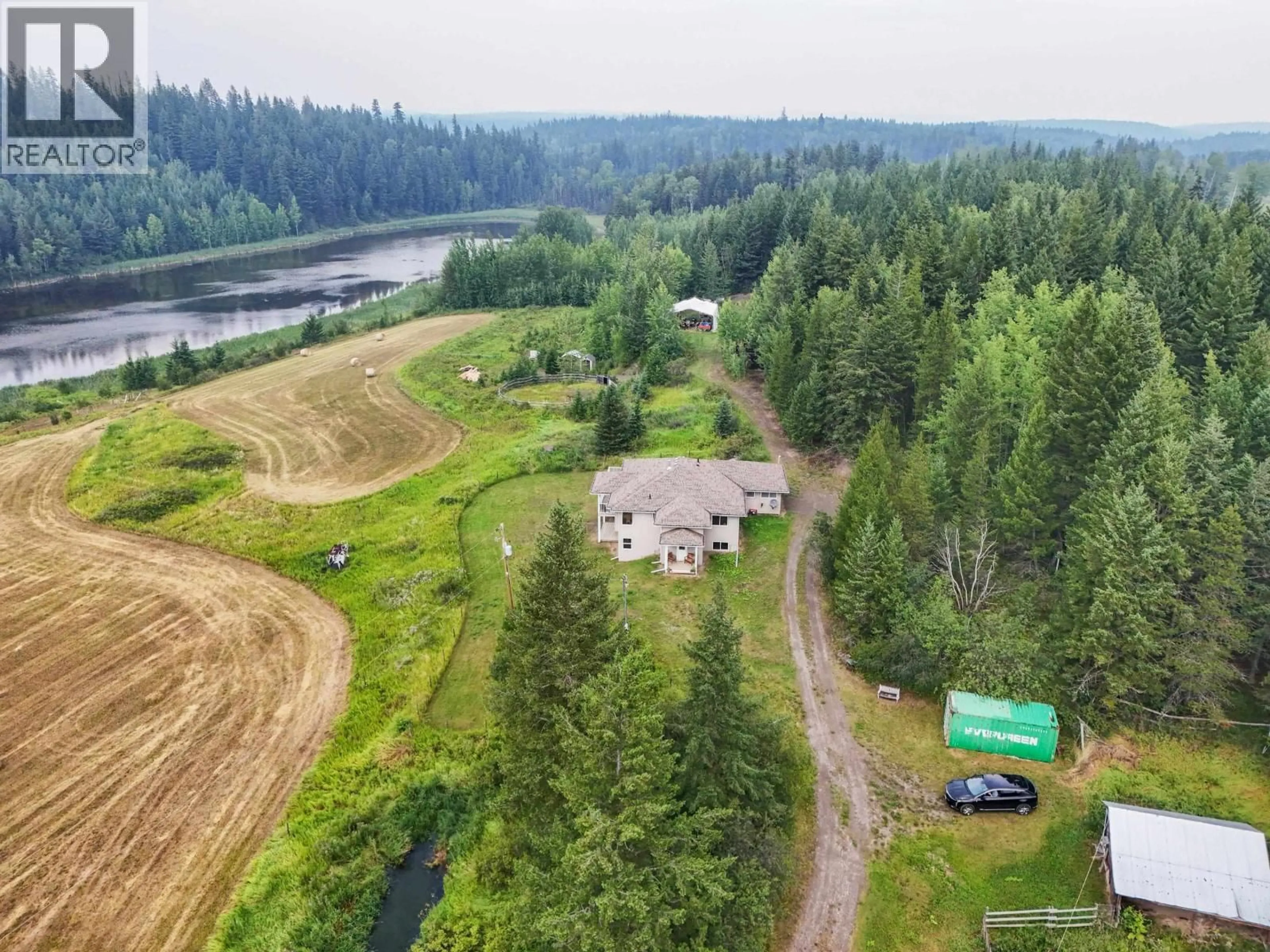 A pic from outside/outdoor area/front of a property/back of a property/a pic from drone, water/lake/river/ocean view for 798 RUTTAN ROAD, Quesnel British Columbia V2J6K2