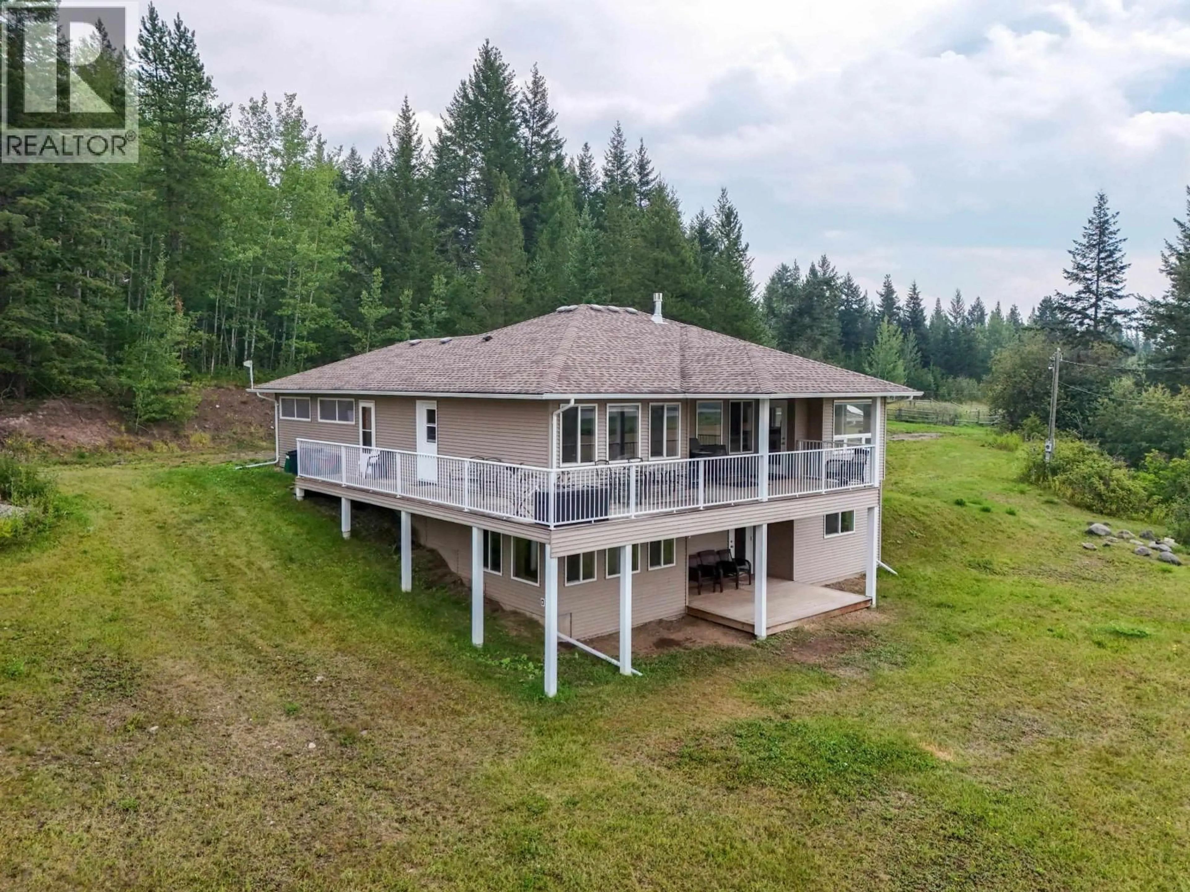A pic from outside/outdoor area/front of a property/back of a property/a pic from drone, water/lake/river/ocean view for 798 RUTTAN ROAD, Quesnel British Columbia V2J6K2