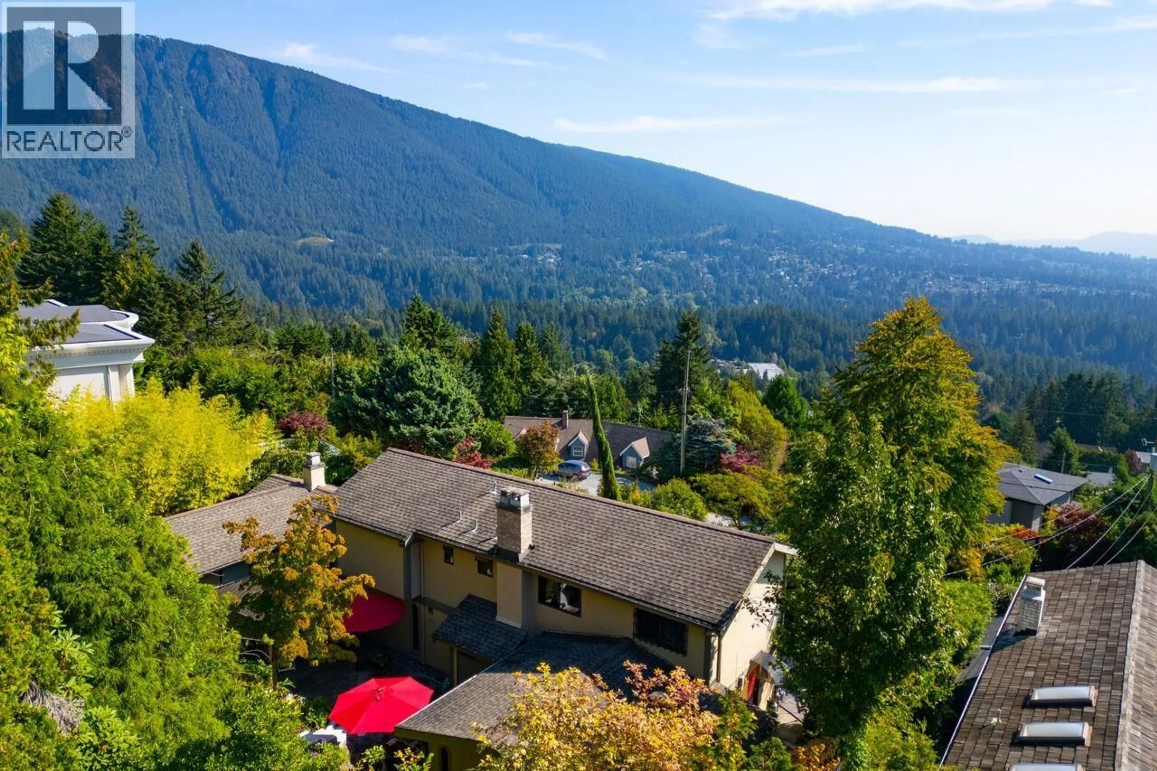 A pic from outside/outdoor area/front of a property/back of a property/a pic from drone, mountain view for 560 CRAIGMOHR DRIVE, West Vancouver British Columbia V7S1W9
