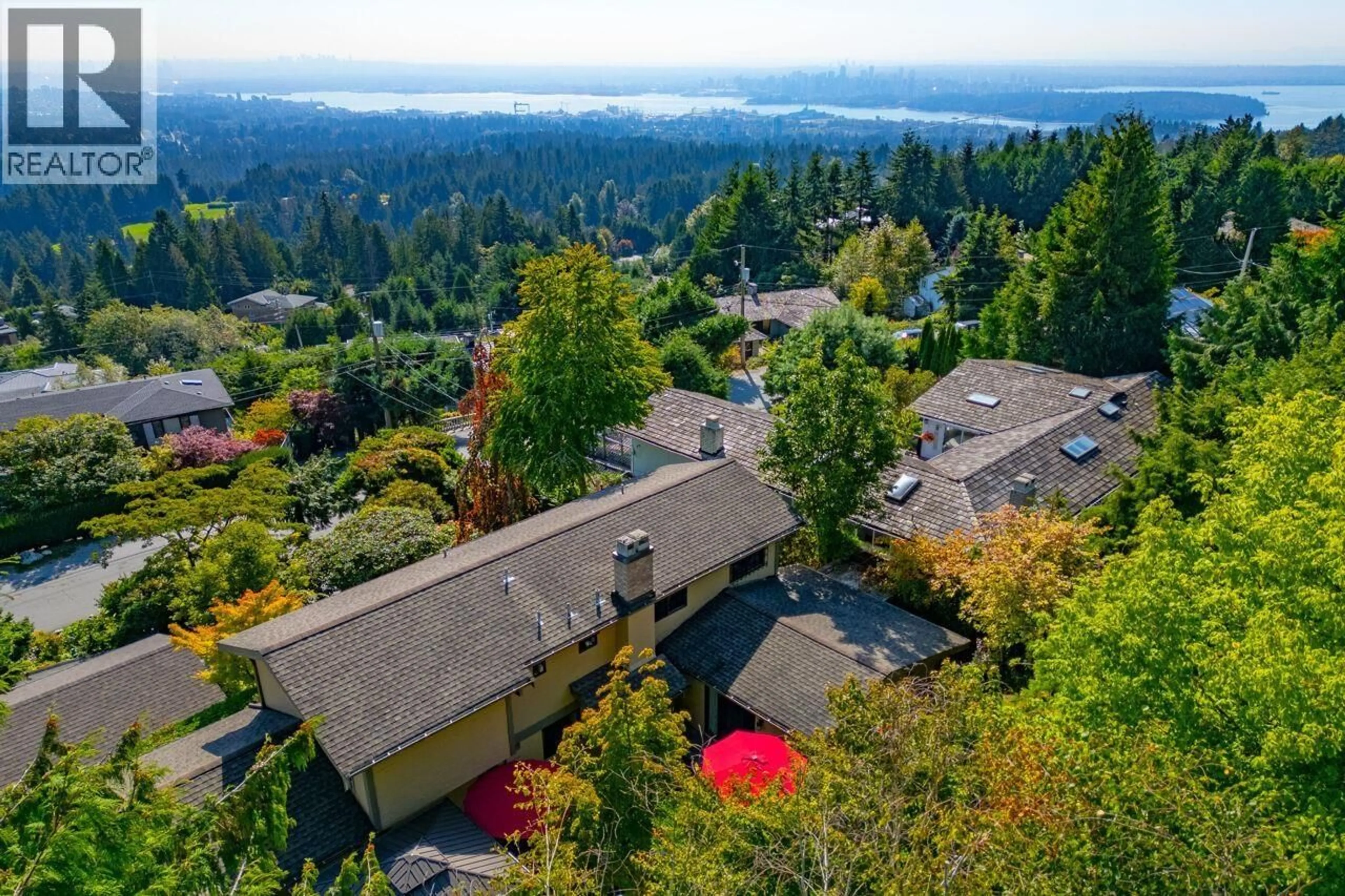 A pic from outside/outdoor area/front of a property/back of a property/a pic from drone, forest/trees view for 560 CRAIGMOHR DRIVE, West Vancouver British Columbia V7S1W9