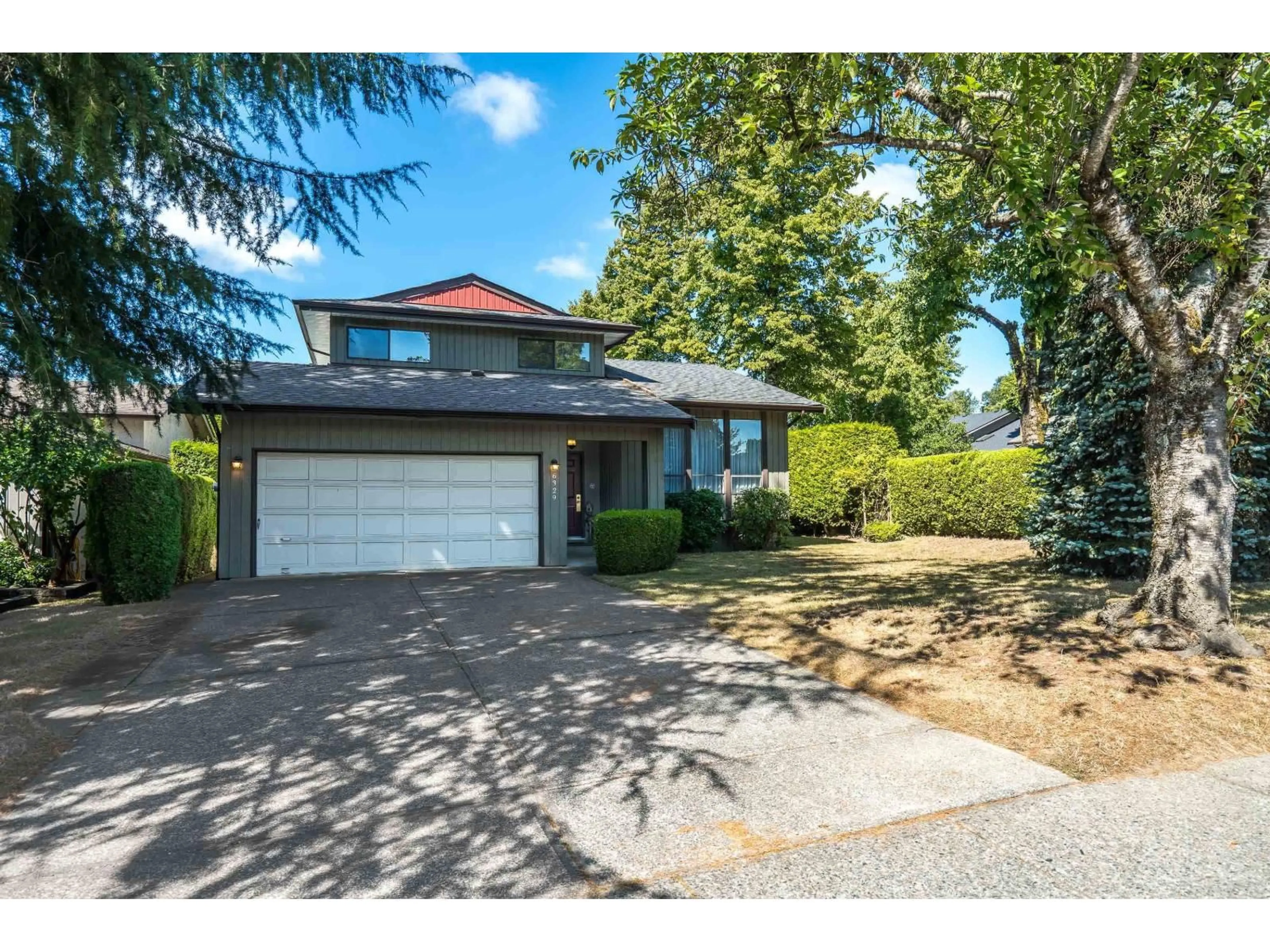 Home with vinyl exterior material, street for 6329 195 STREET, Surrey British Columbia V3S7L8