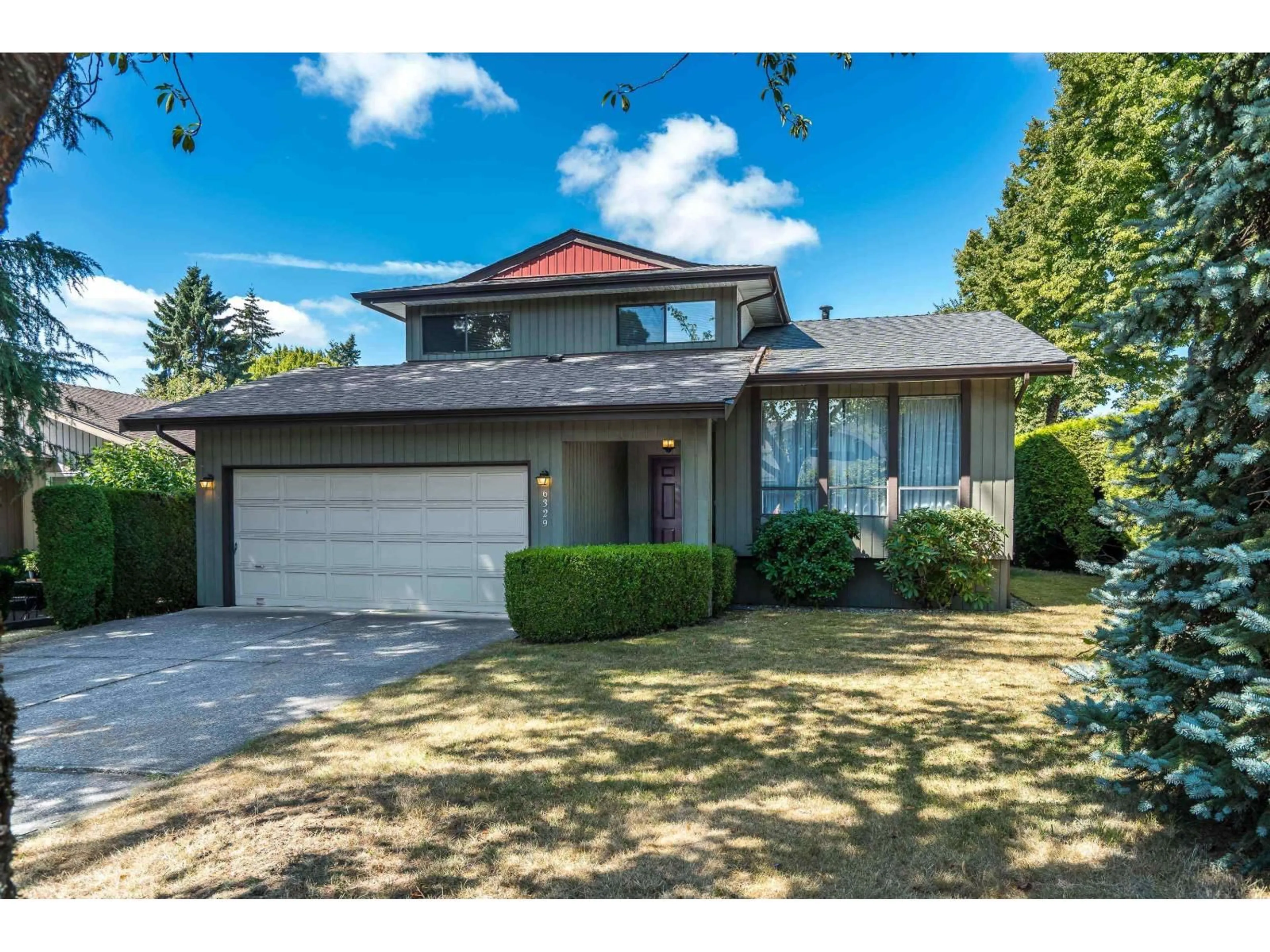 Home with vinyl exterior material, street for 6329 195 STREET, Surrey British Columbia V3S7L8