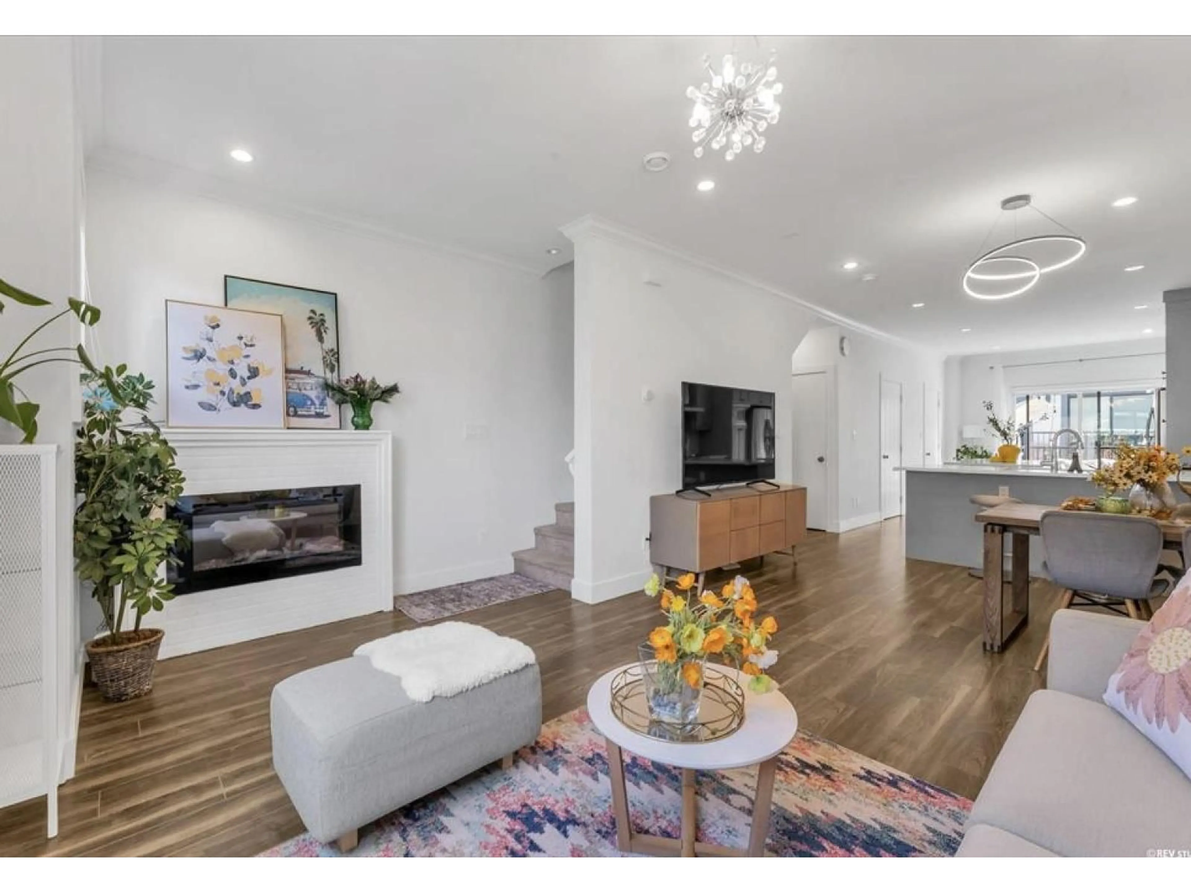 Living room with furniture, wood/laminate floor for 2 - 16361 23A AVENUE, Surrey British Columbia V3Z0V9