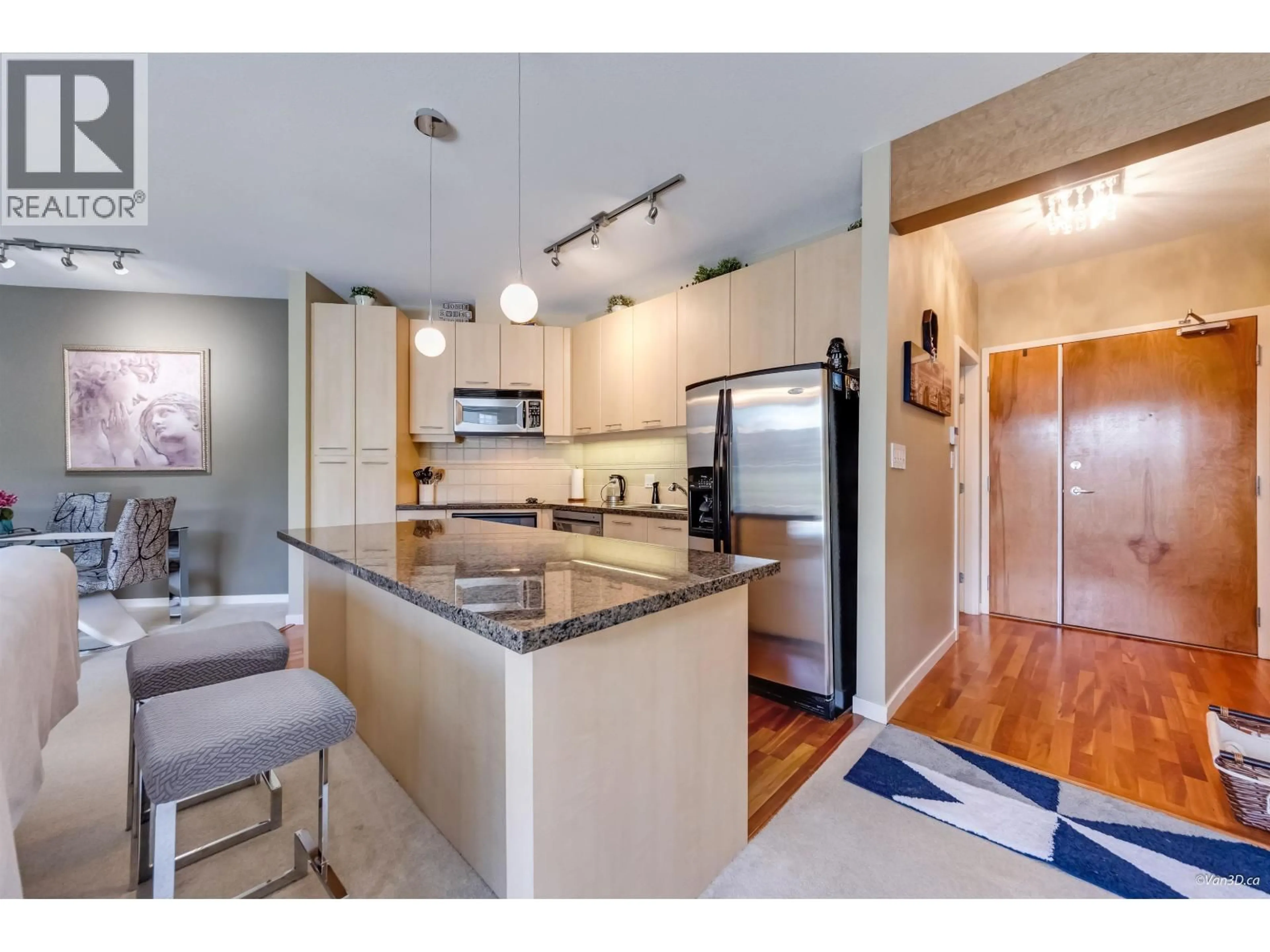 Open concept kitchen, unknown for 512 - 560 RAVEN WOODS DRIVE, North Vancouver British Columbia V7G2T3