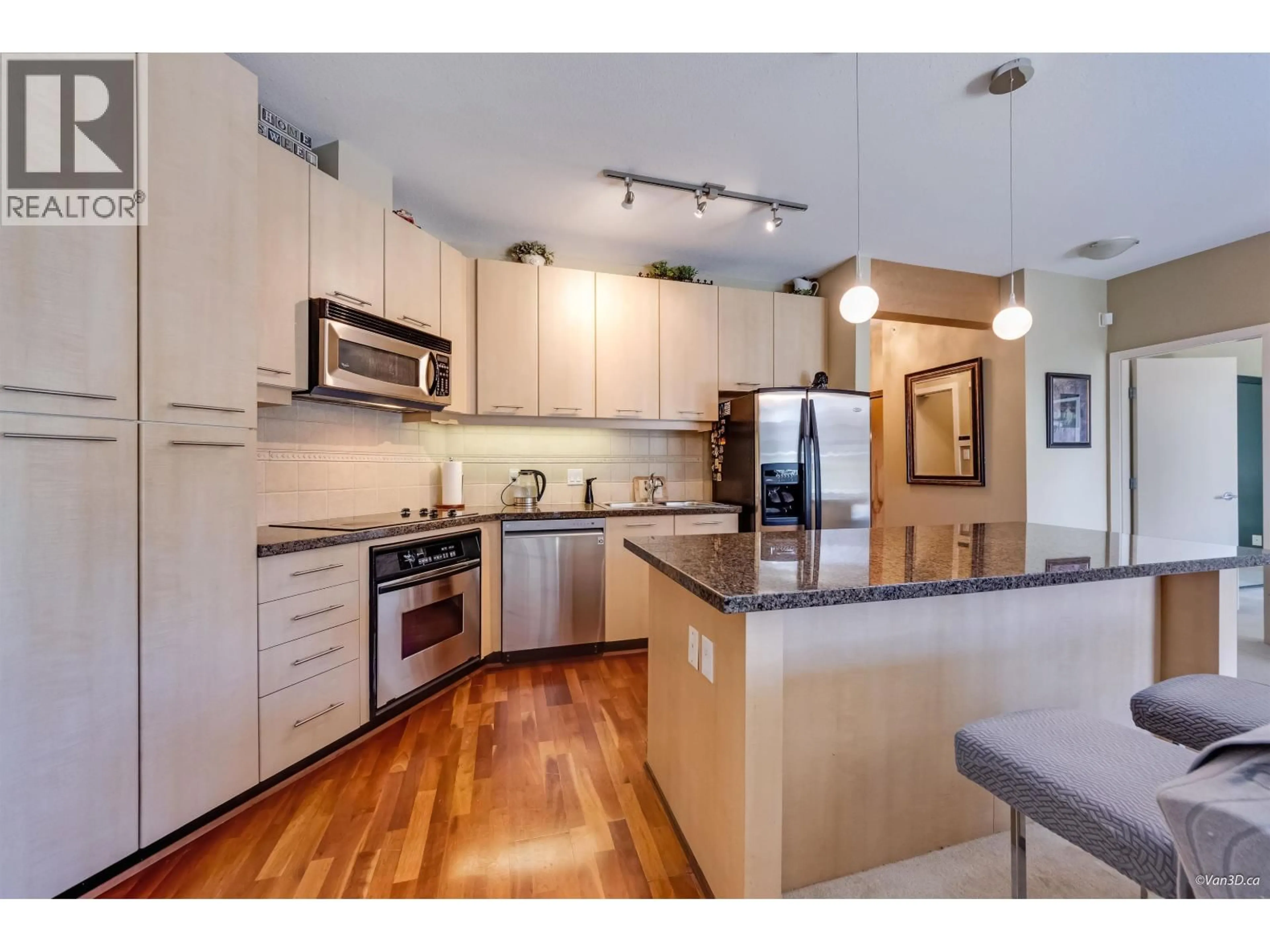 Open concept kitchen, unknown for 512 - 560 RAVEN WOODS DRIVE, North Vancouver British Columbia V7G2T3