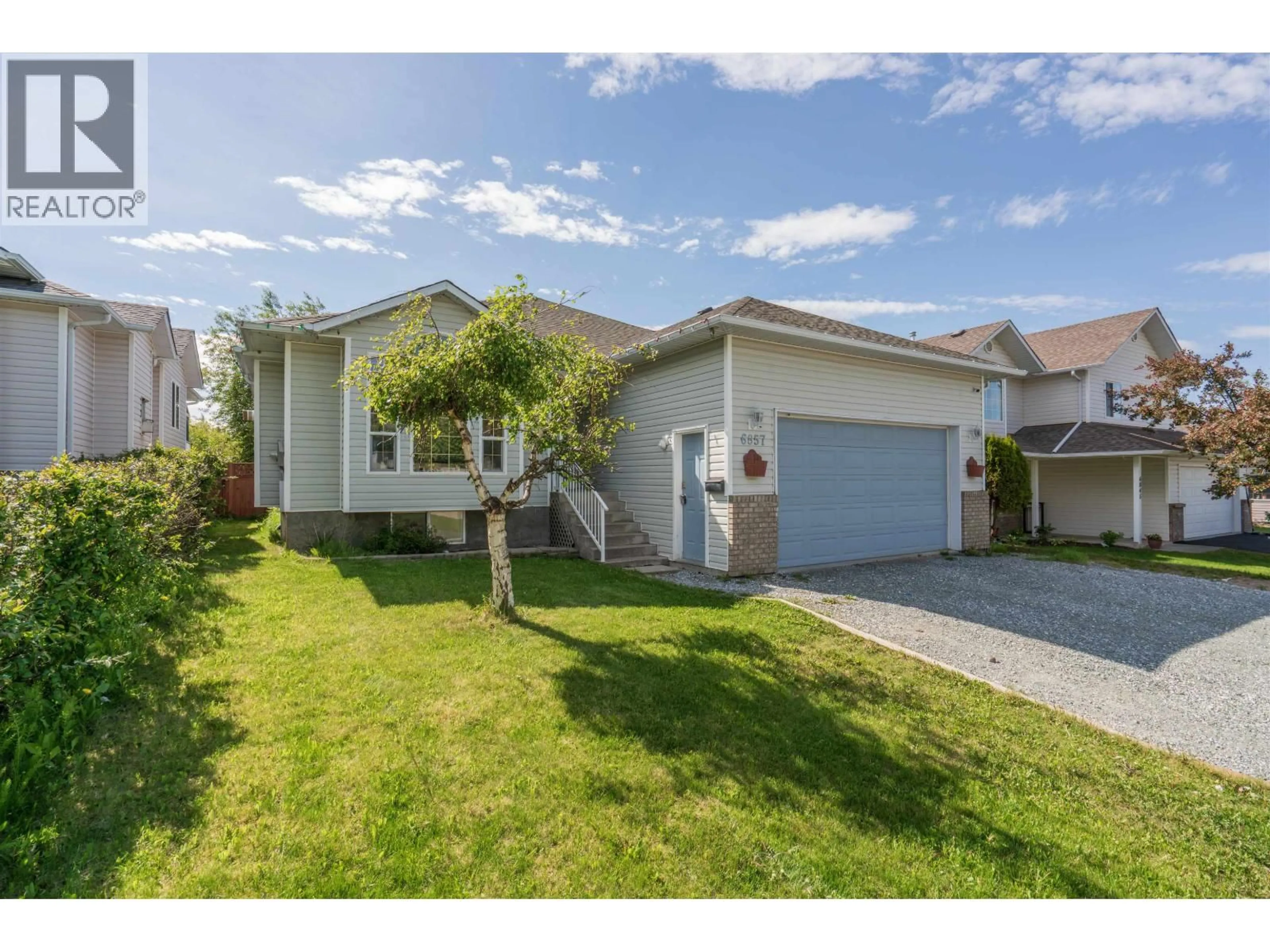 Home with vinyl exterior material, street for 6857 WESTGATE AVENUE, Prince George British Columbia V2N5R2