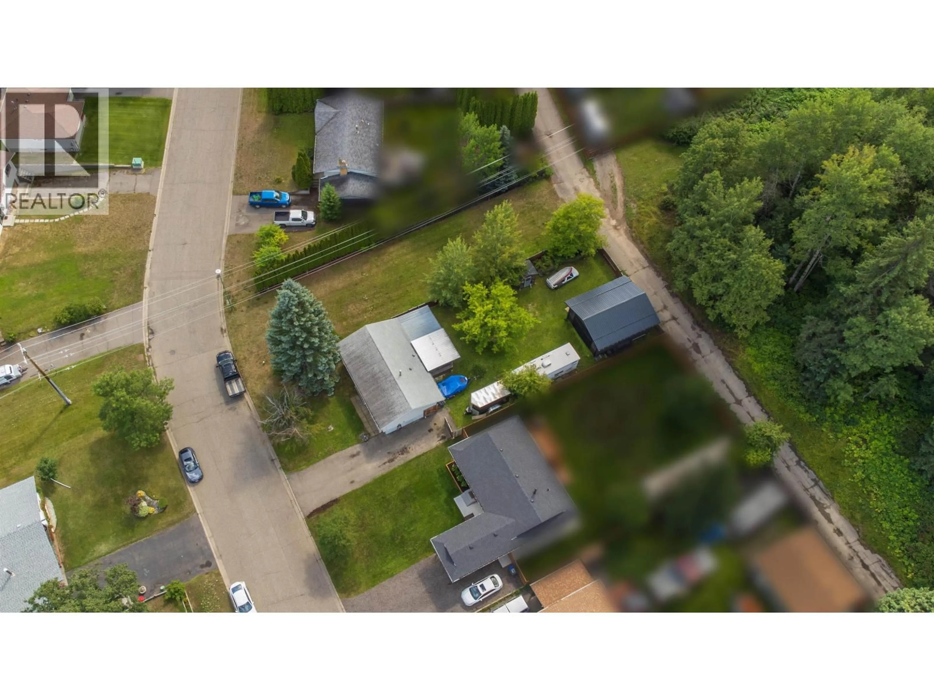 A pic from outside/outdoor area/front of a property/back of a property/a pic from drone, street for 2099 MACDONALD AVENUE, Prince George British Columbia V2L4G5