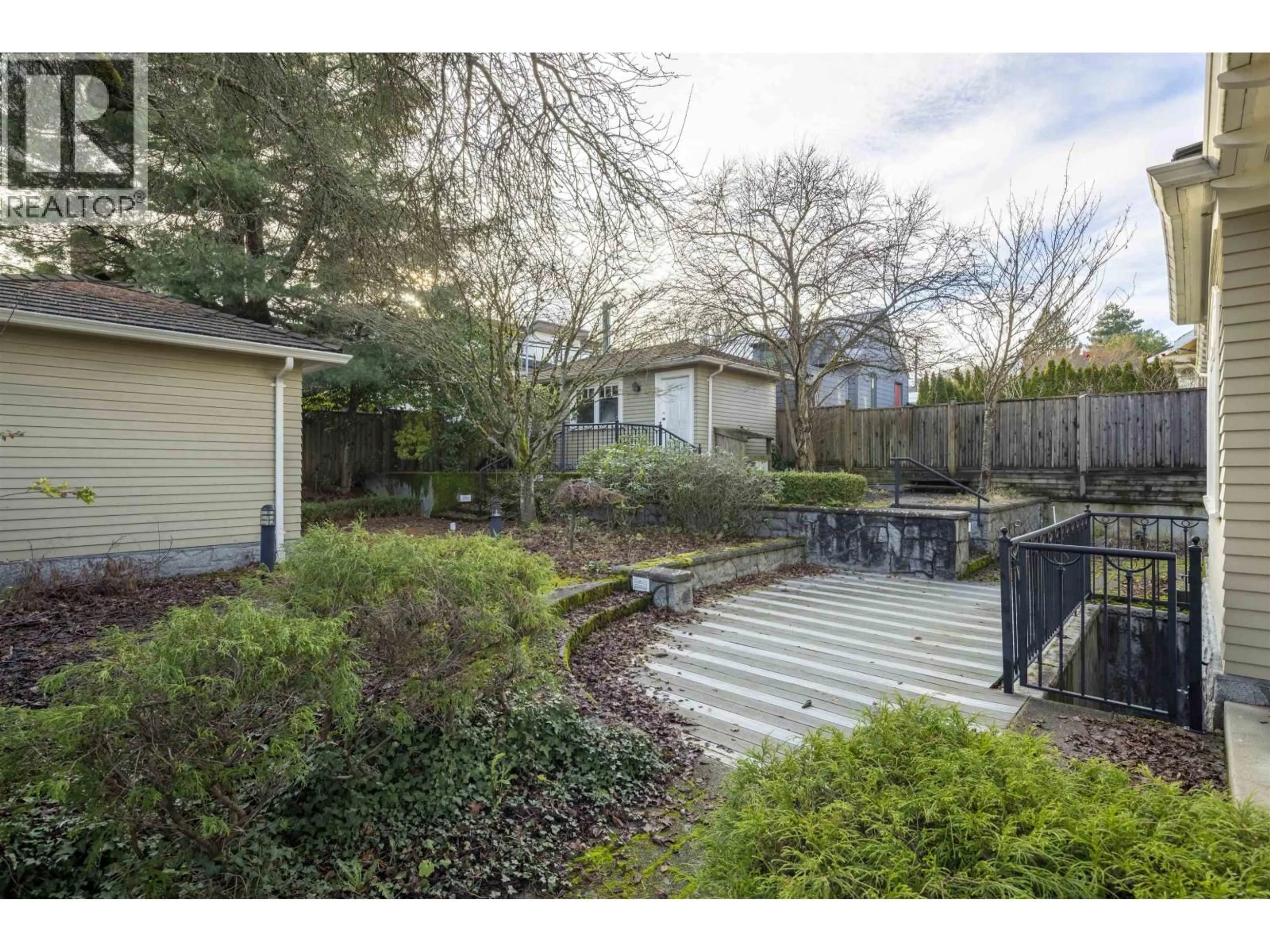 A pic from outside/outdoor area/front of a property/back of a property/a pic from drone, street for 3808 13TH AVENUE, Vancouver British Columbia V6R2S8