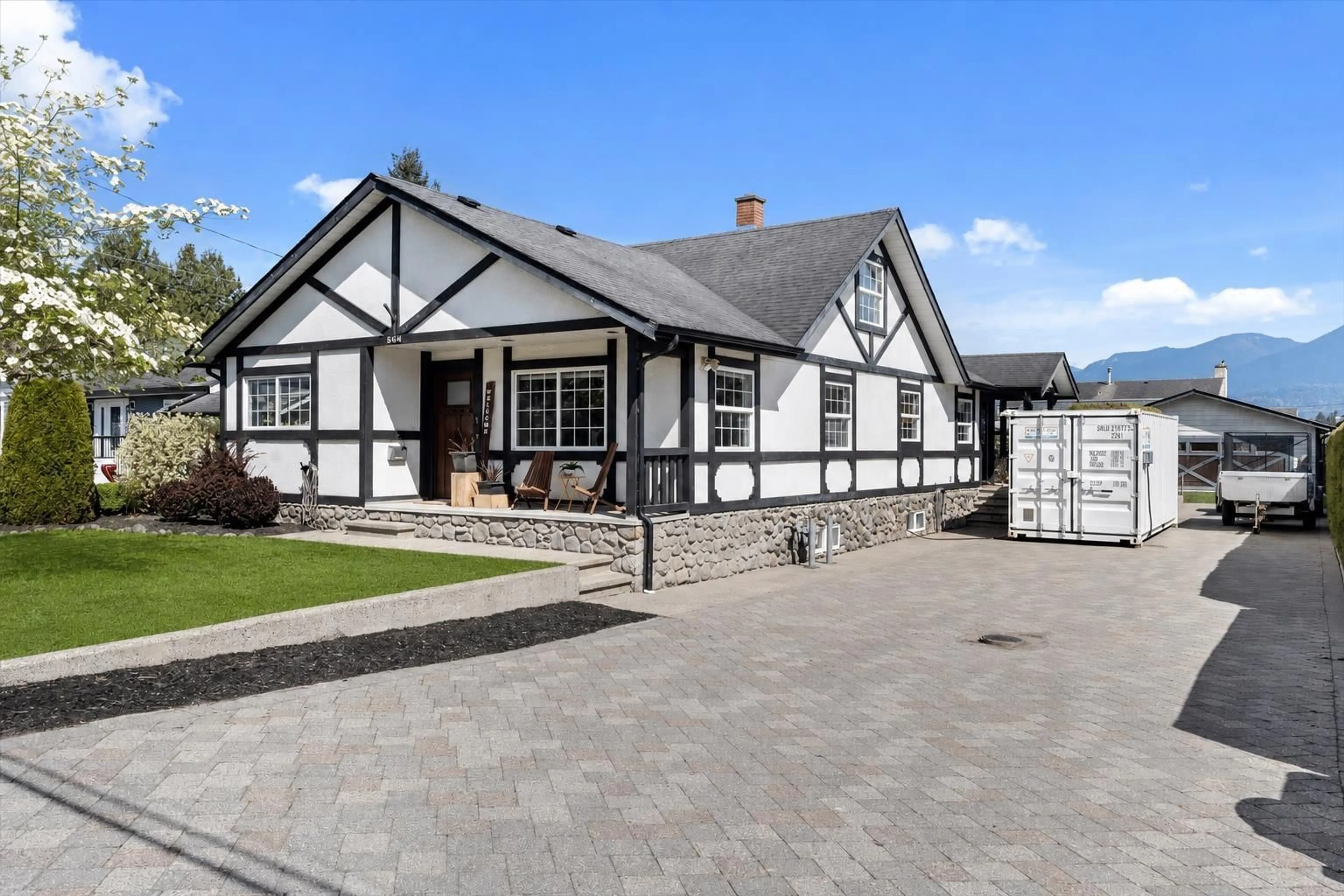 A pic from outside/outdoor area/front of a property/back of a property/a pic from drone, street for 6464 REID ROAD, Chilliwack British Columbia V2R1T9