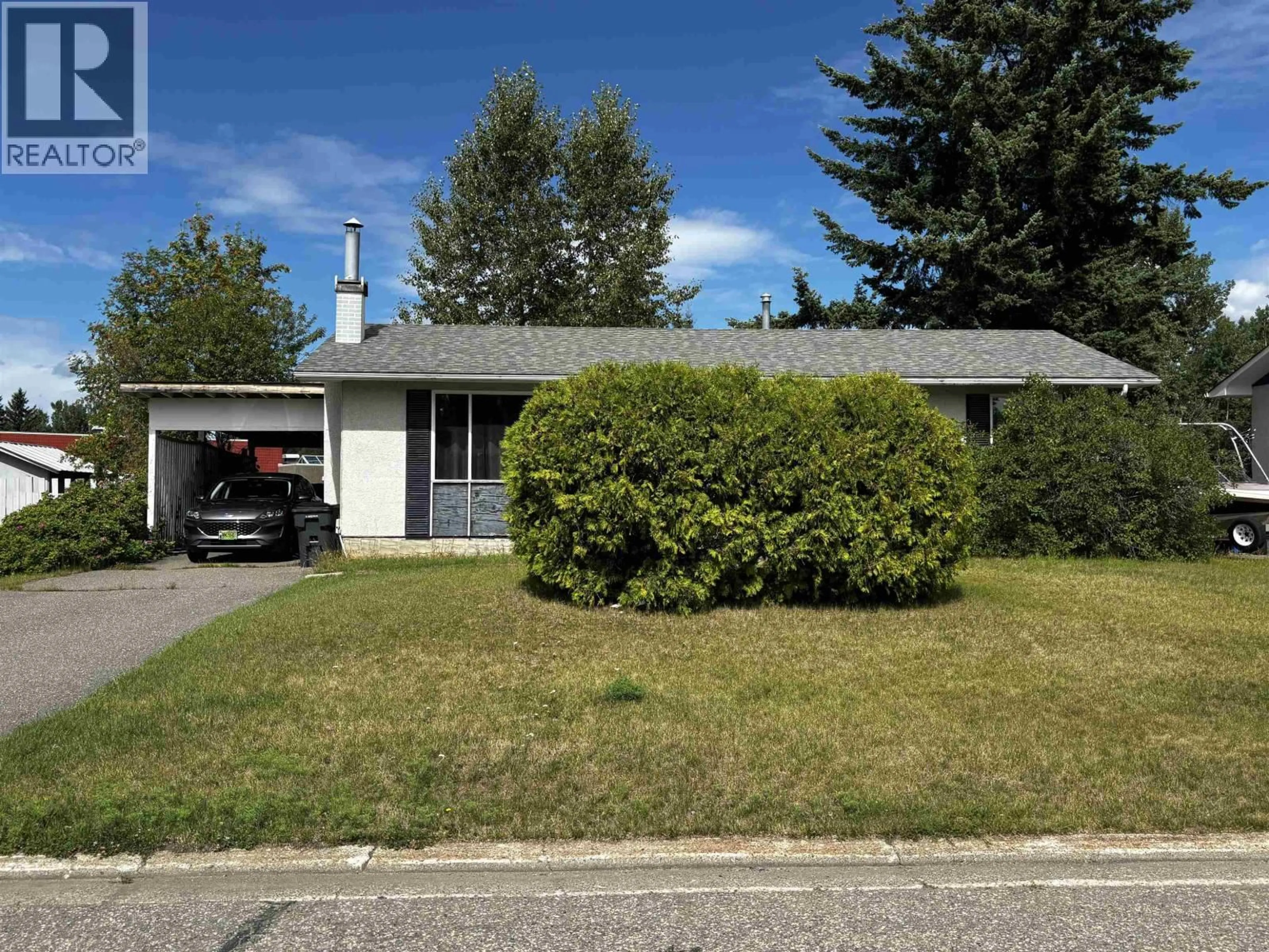 Home with vinyl exterior material, street for 7049 HARVARD CRESCENT, Prince George British Columbia V2N2V6